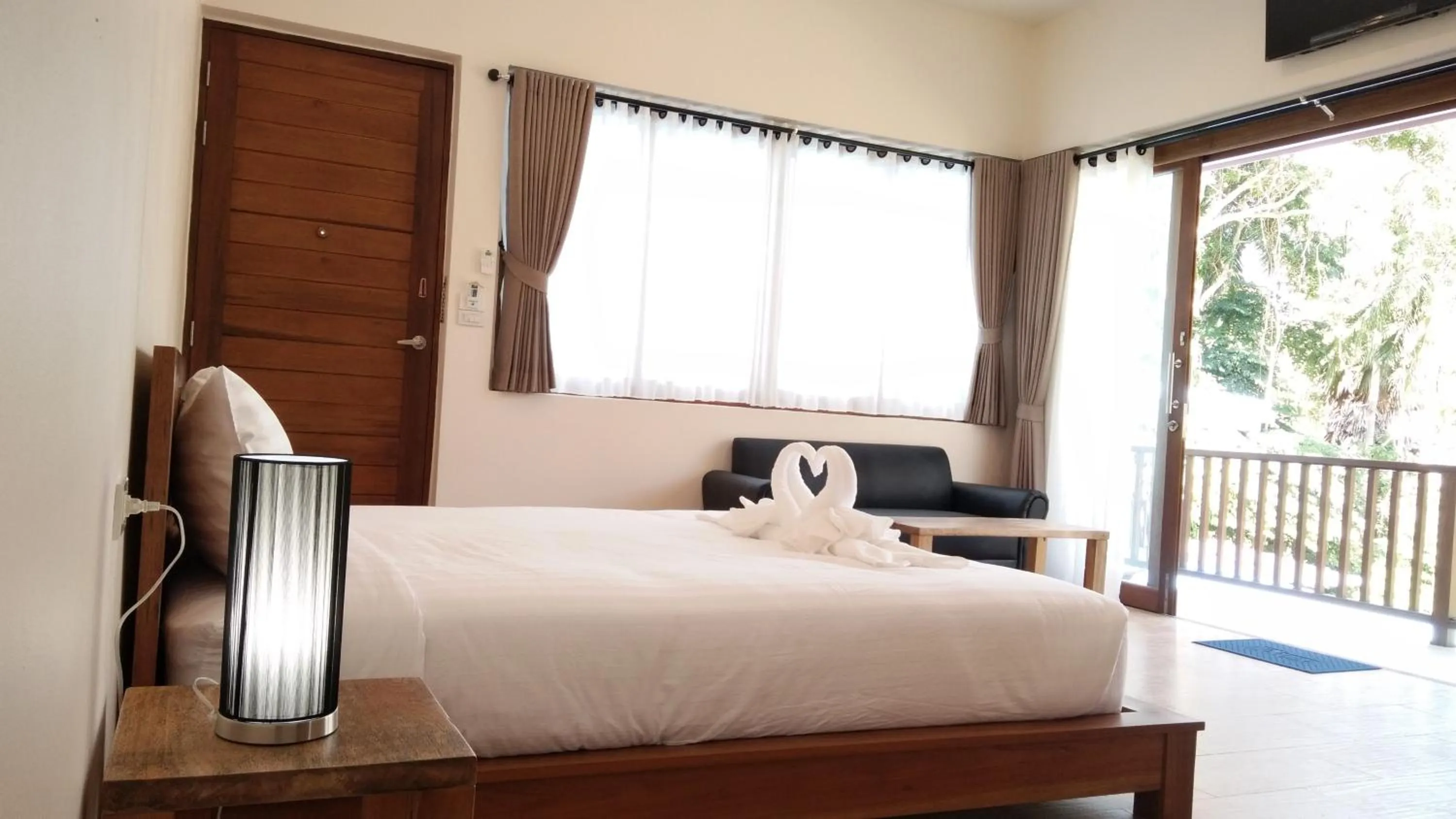 Bed in Le Grand Bleu Hotel