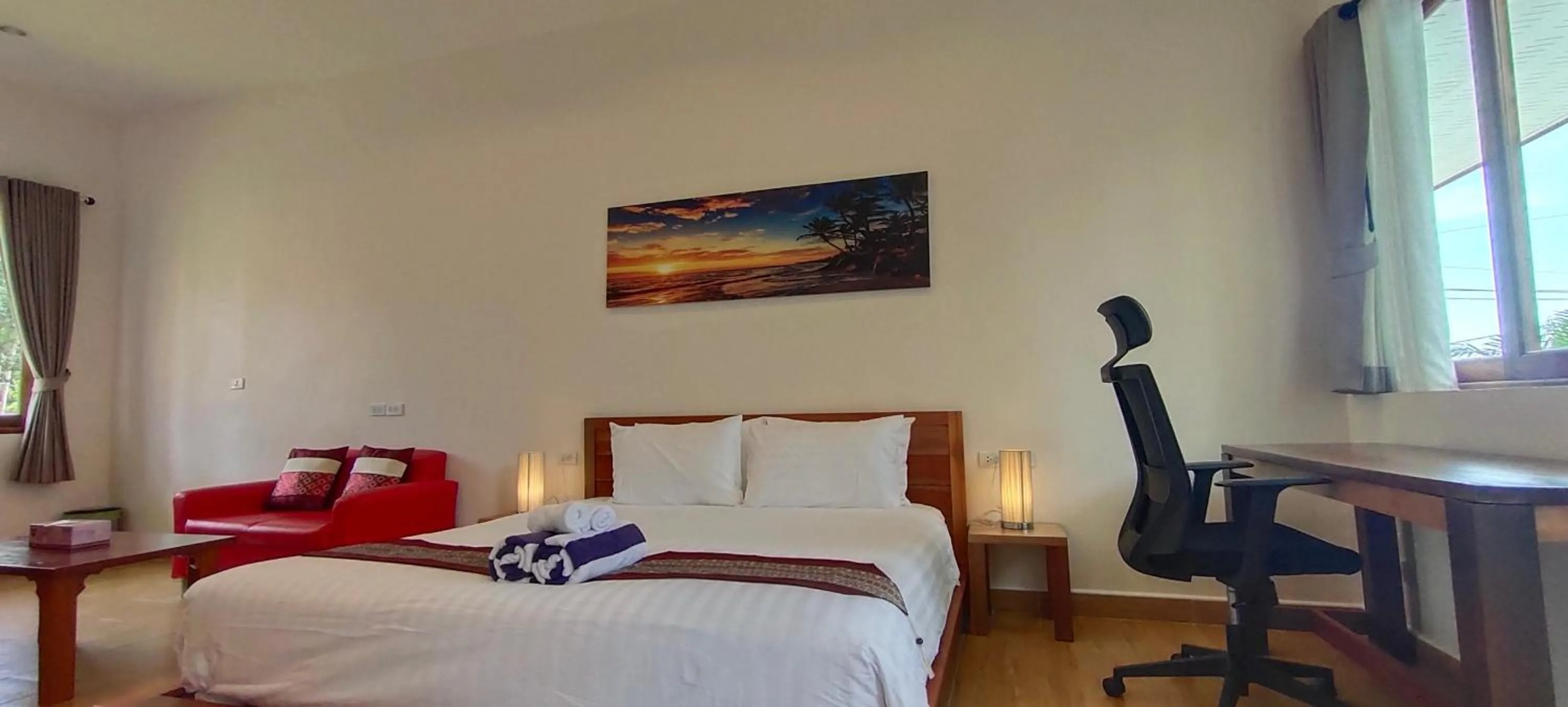 Bed in Le Grand Bleu Hotel