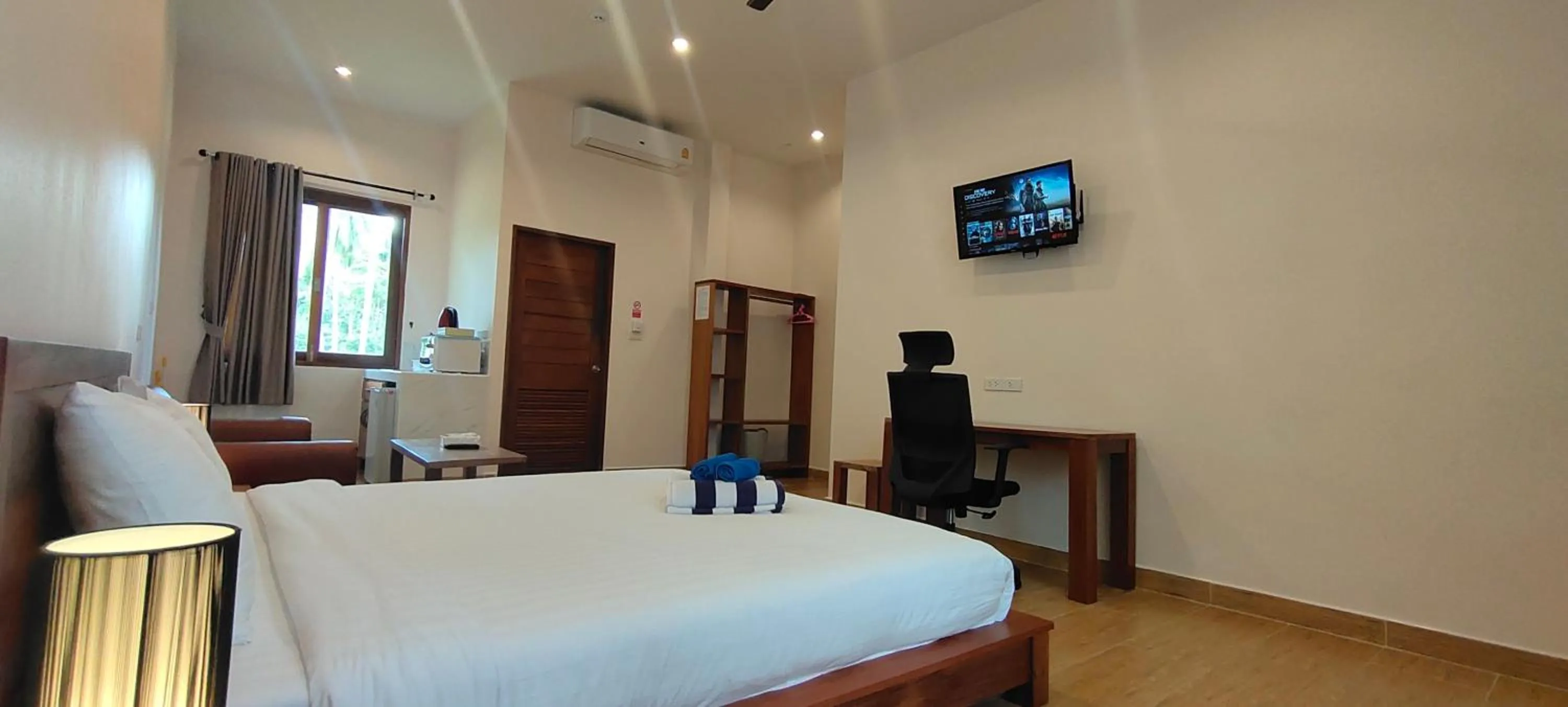 Bed in Le Grand Bleu Hotel