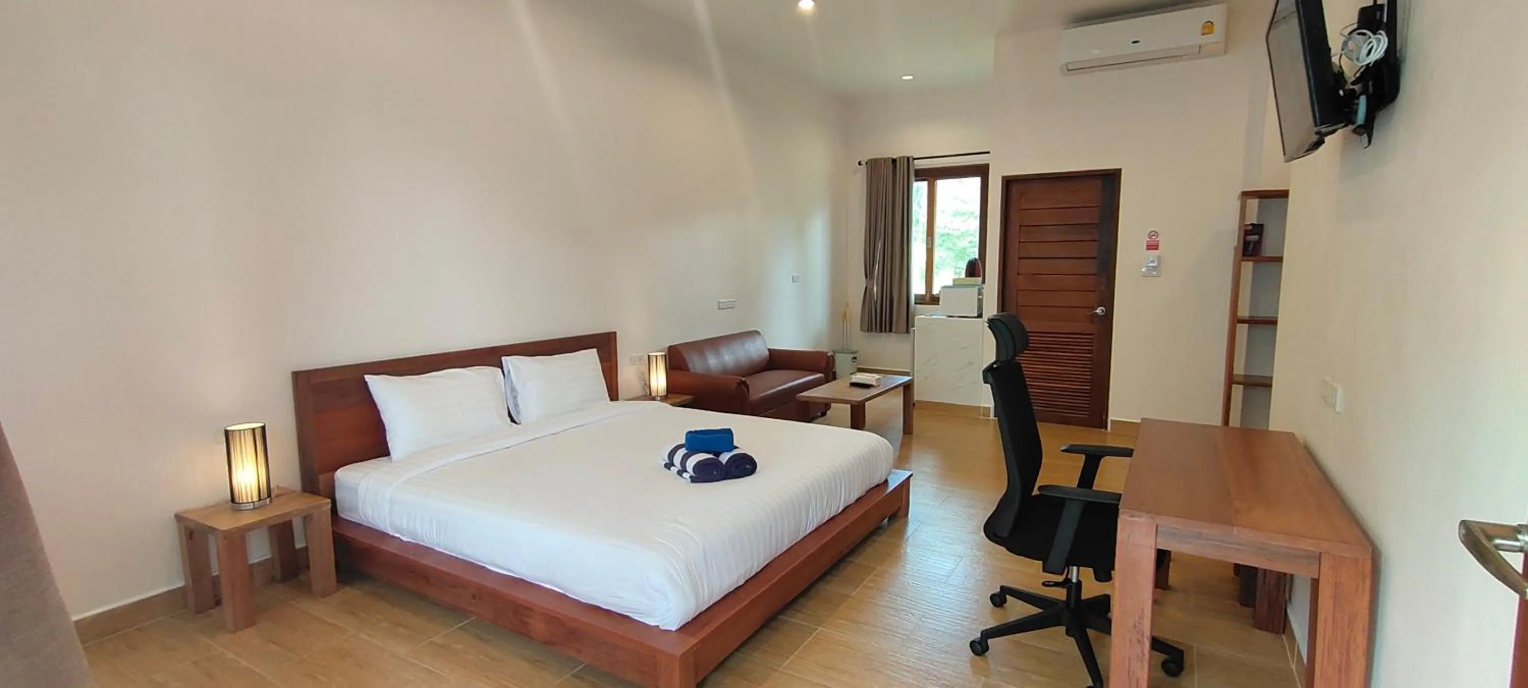 Bed in Le Grand Bleu Hotel