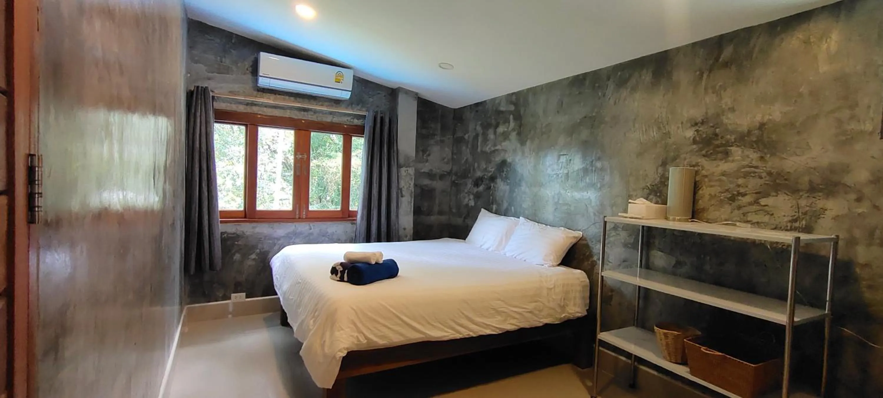 Bed in Le Grand Bleu Hotel