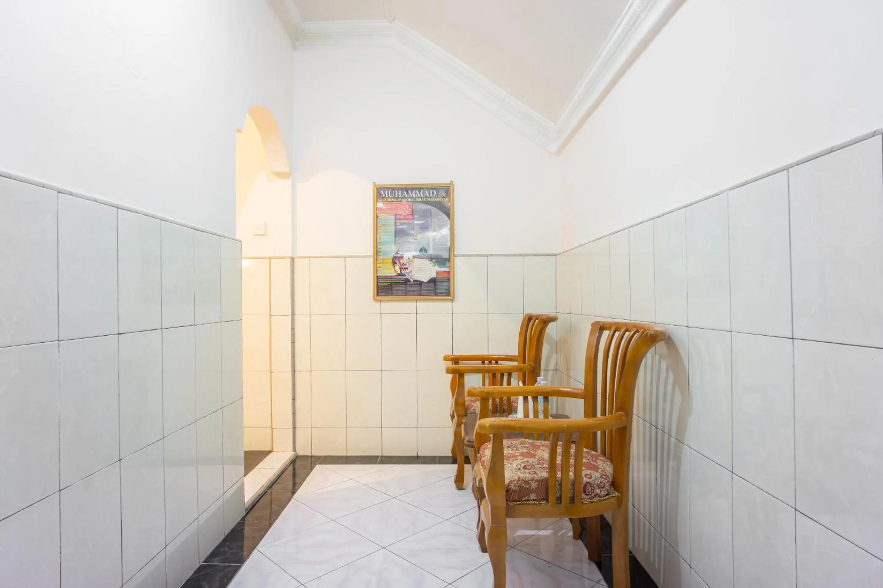 Bedroom in OYO 2180 Vina Vira Hotel