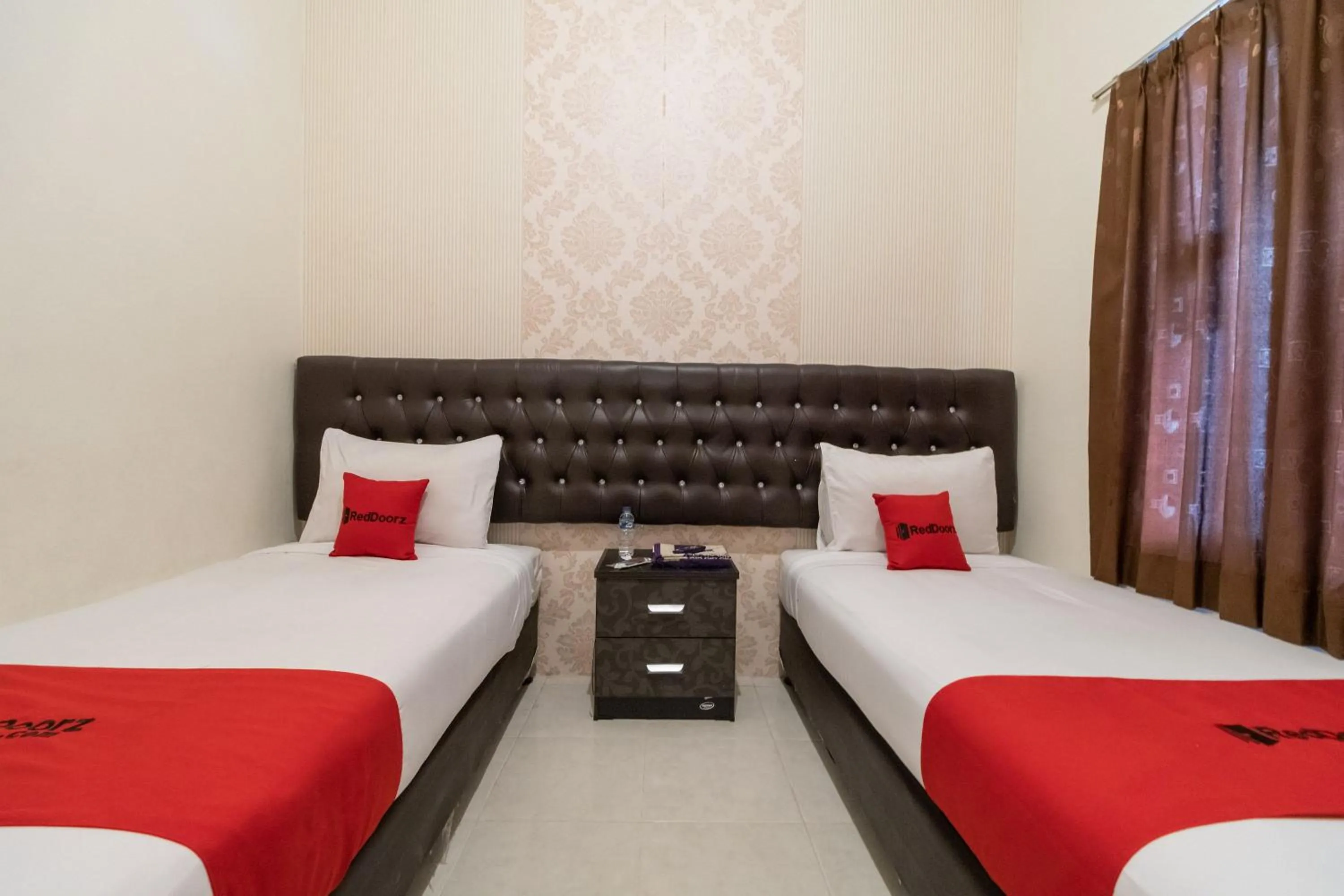 Bedroom, Bed in RedDoorz Syariah at D'Ostha Residence