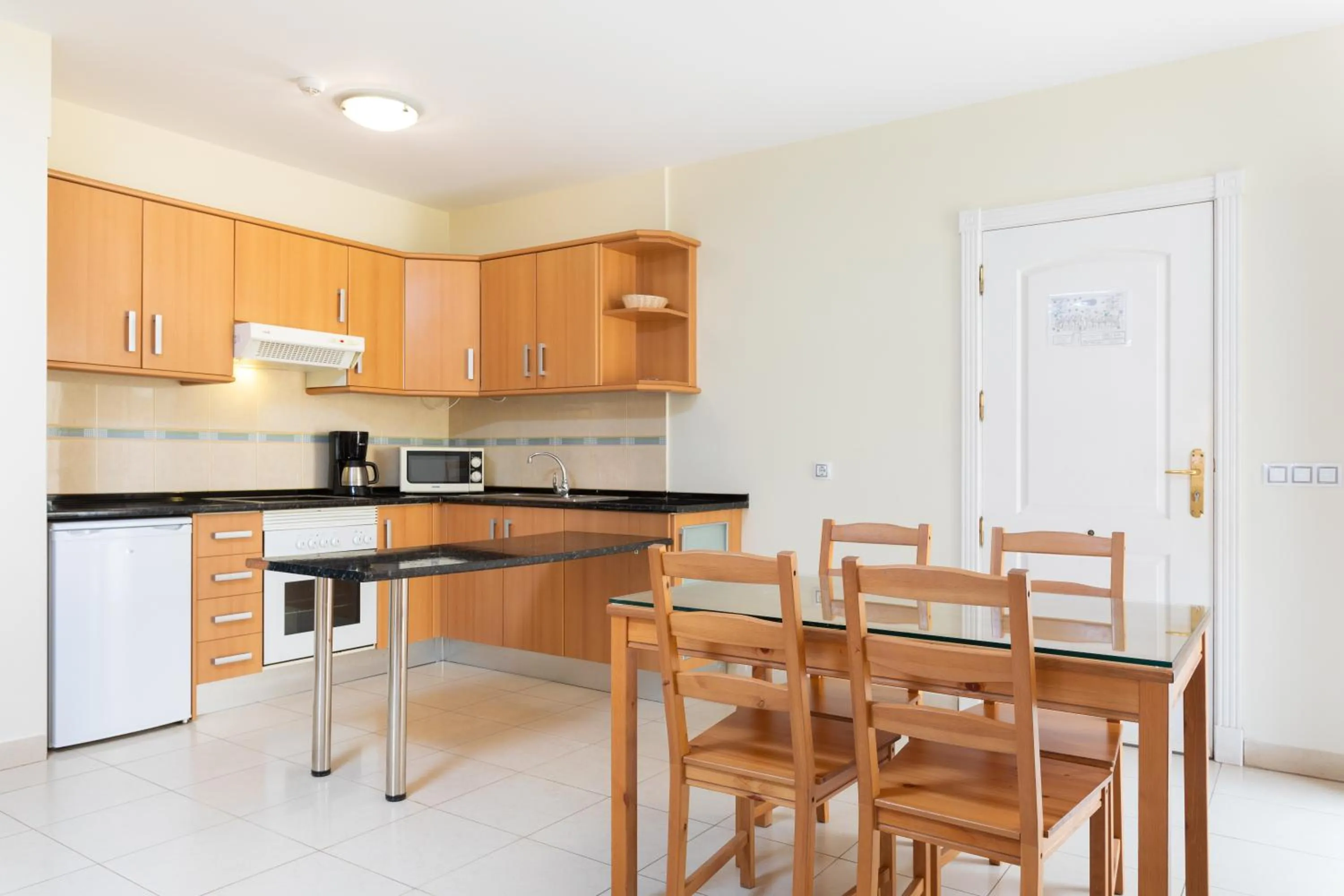 Kitchen or kitchenette in Residencial El Llano