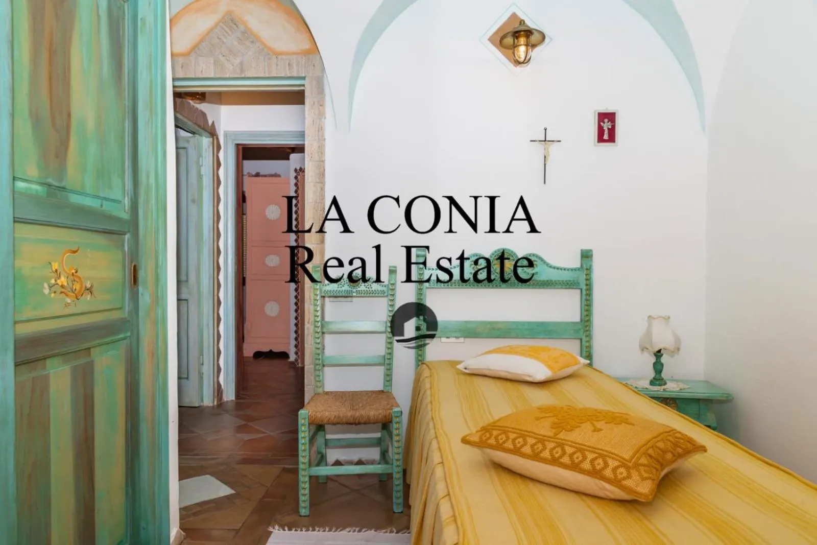 Bed in blue sea villa