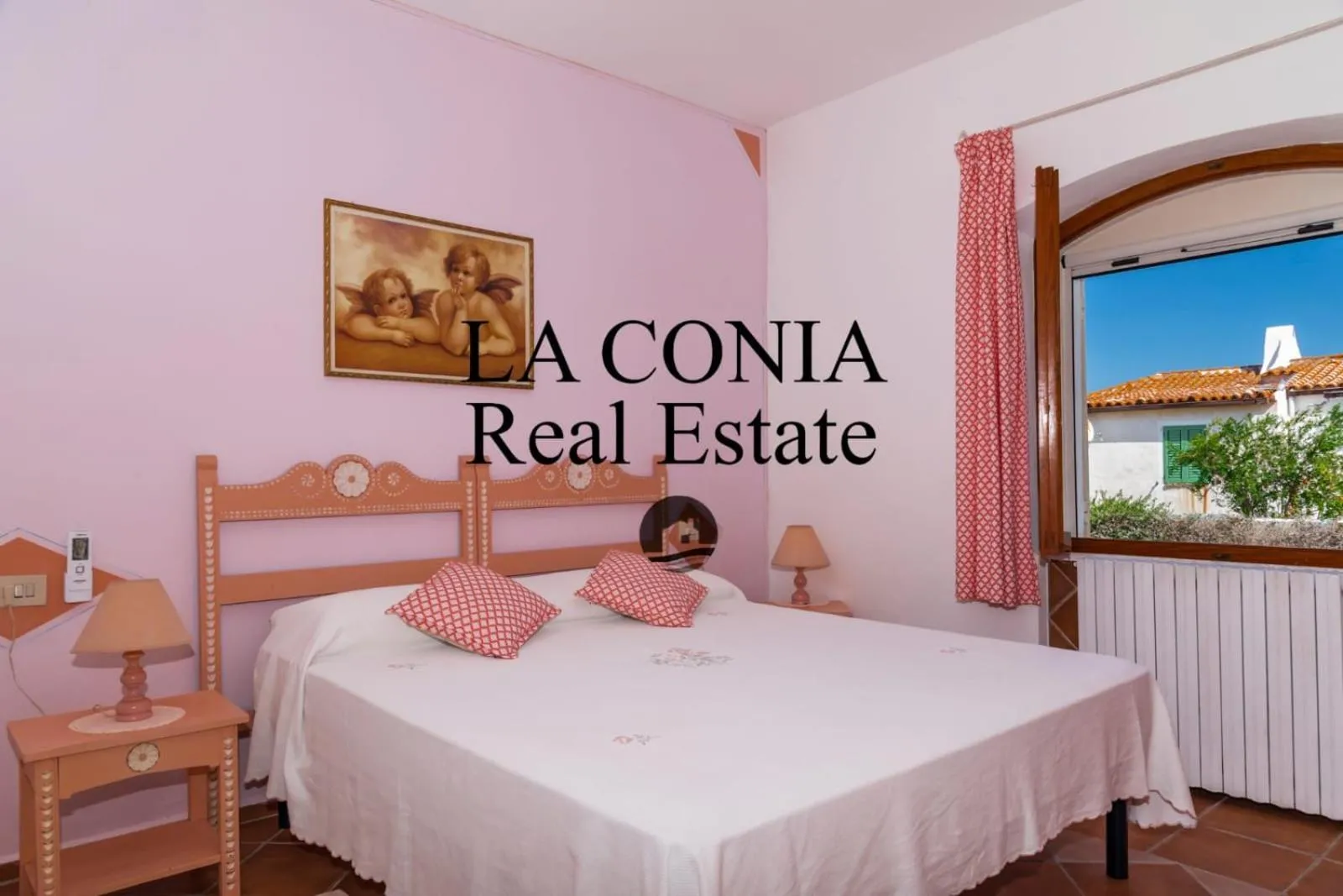 Bed in blue sea villa