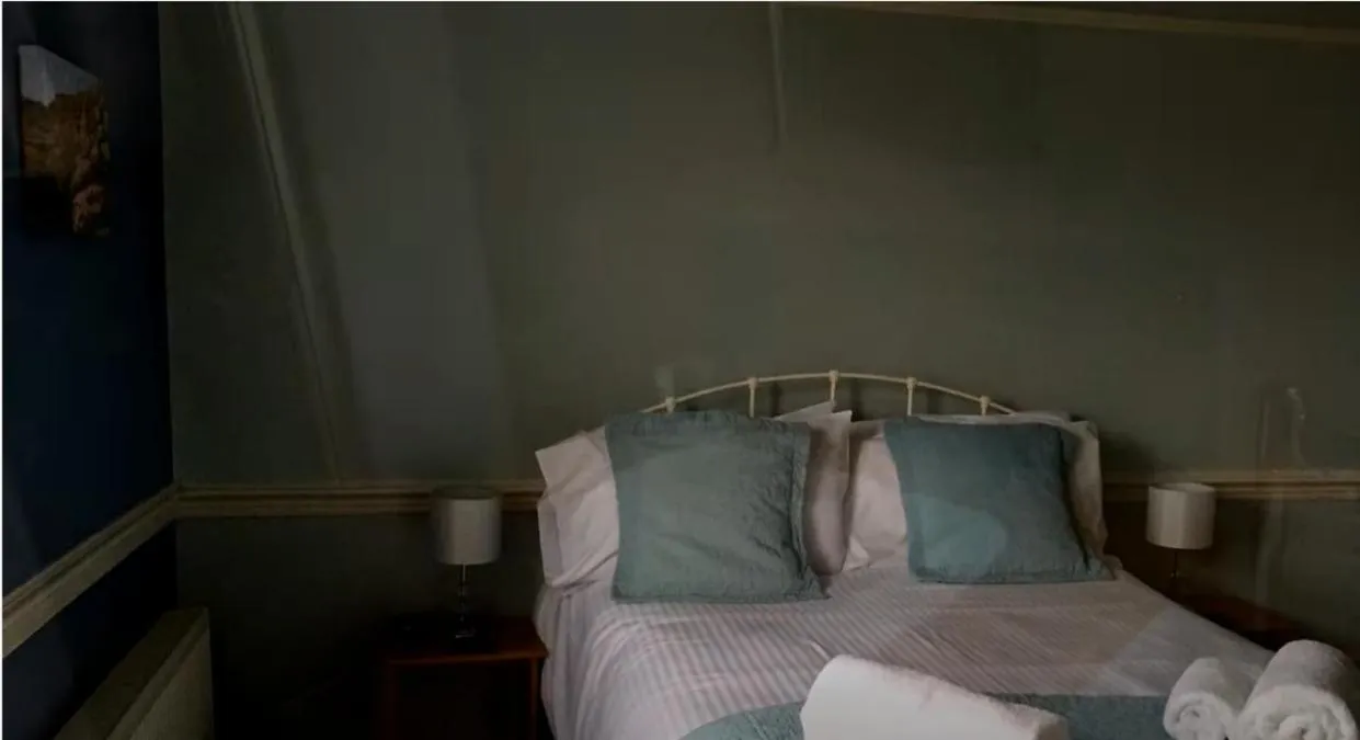 Bedroom in The Top House Inn