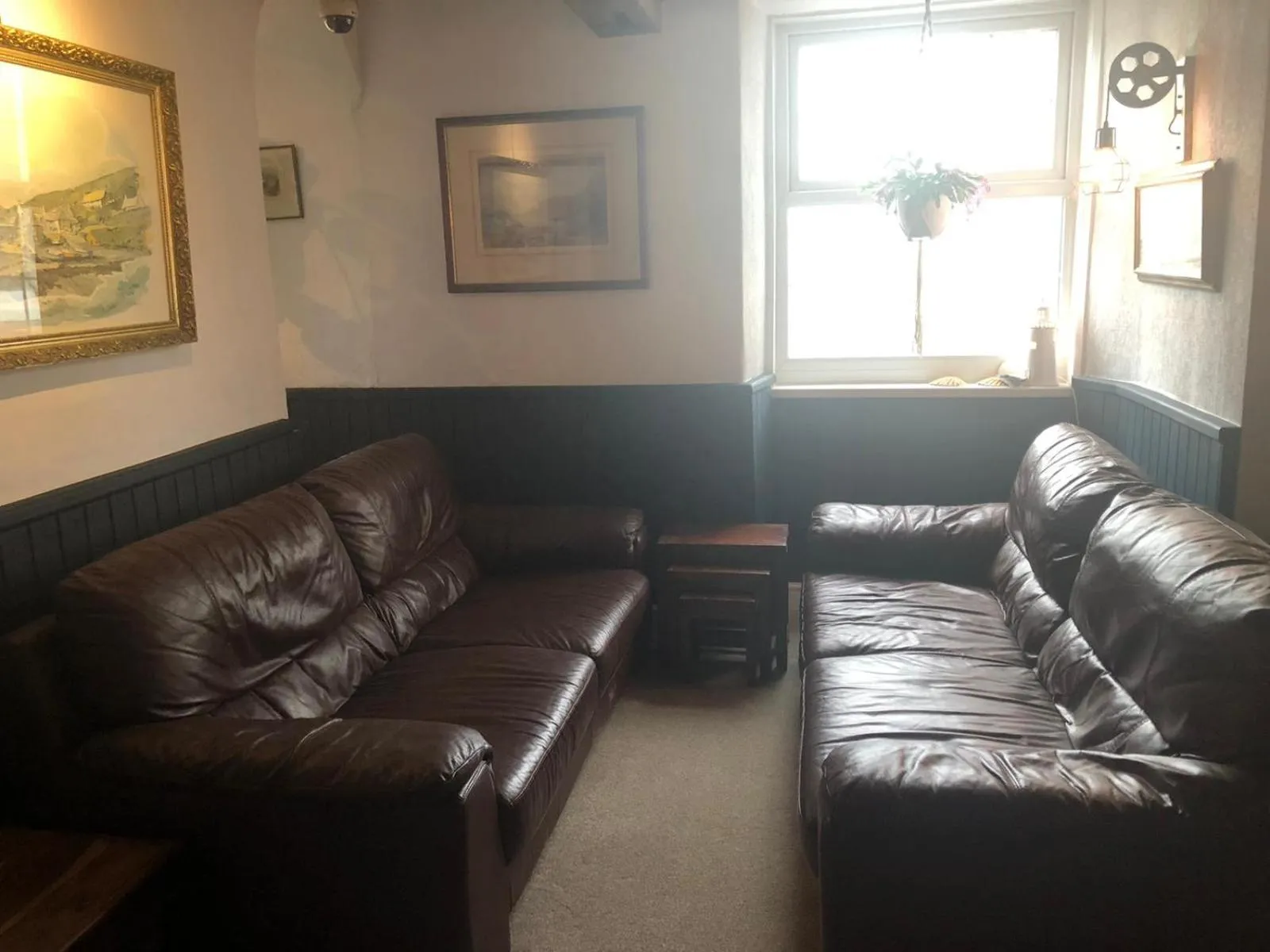 Lounge or bar in The Top House Inn