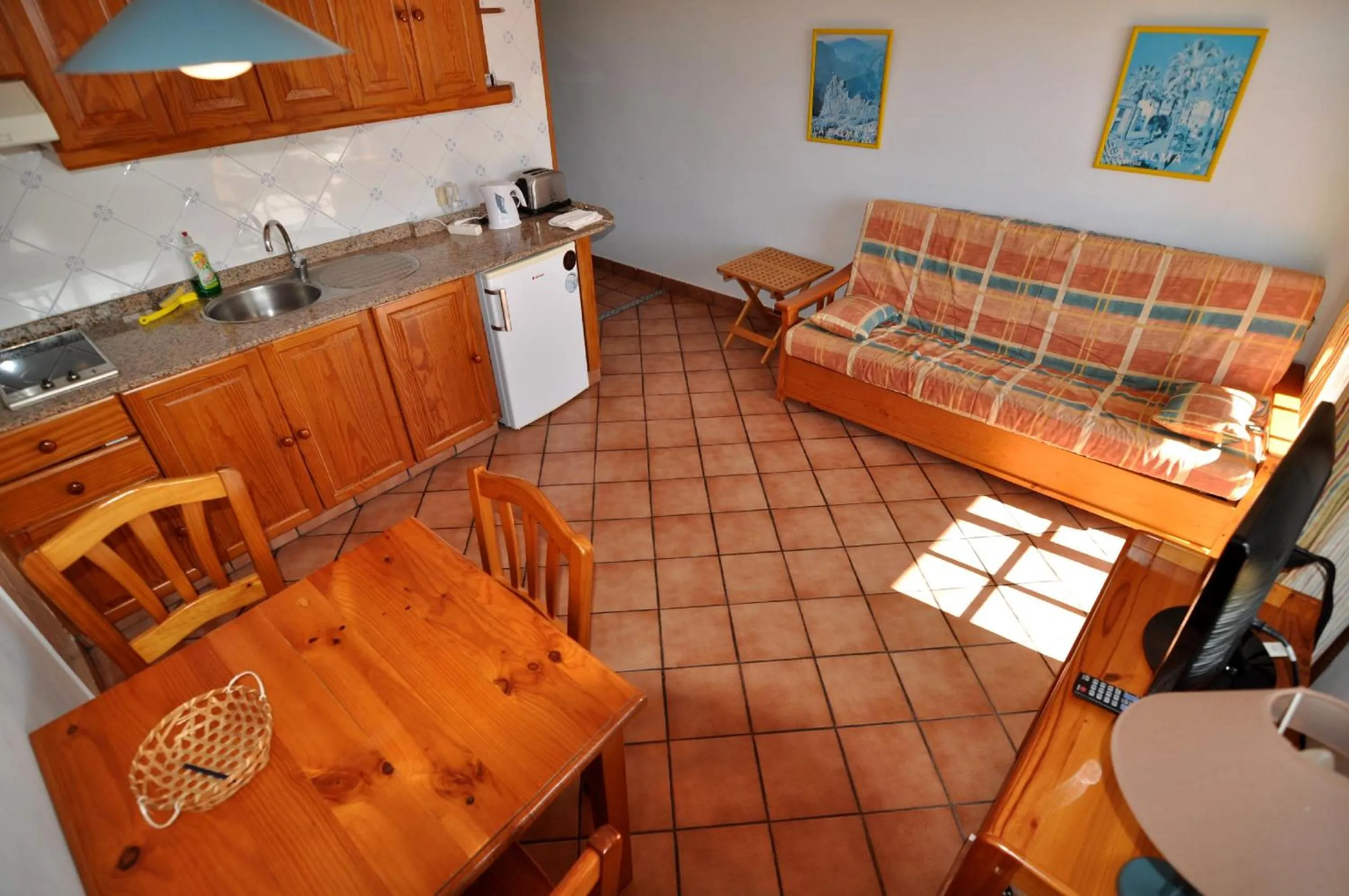 Kitchen or kitchenette in Apartamentos Atlantis