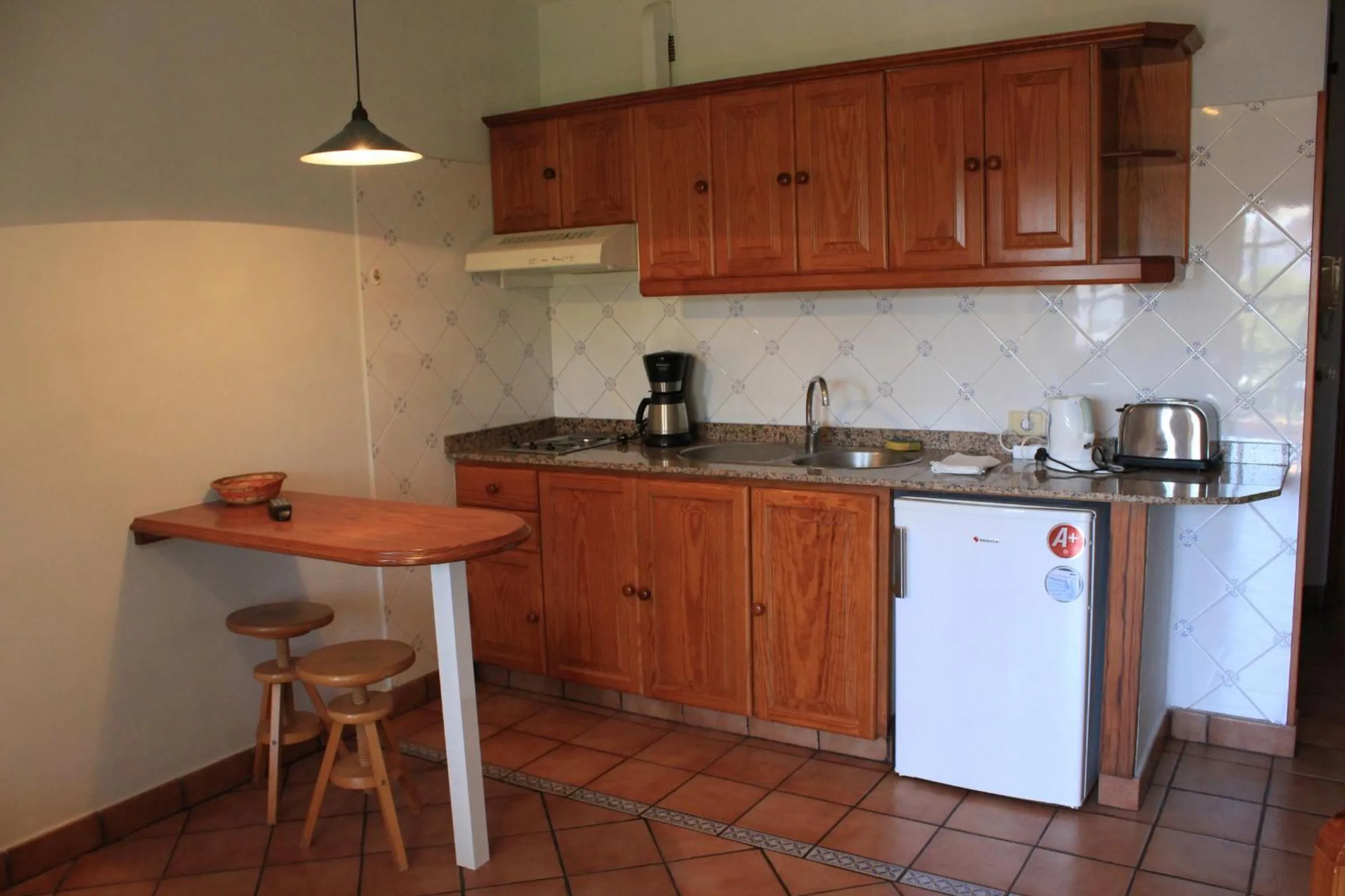 Kitchen or kitchenette in Apartamentos Atlantis