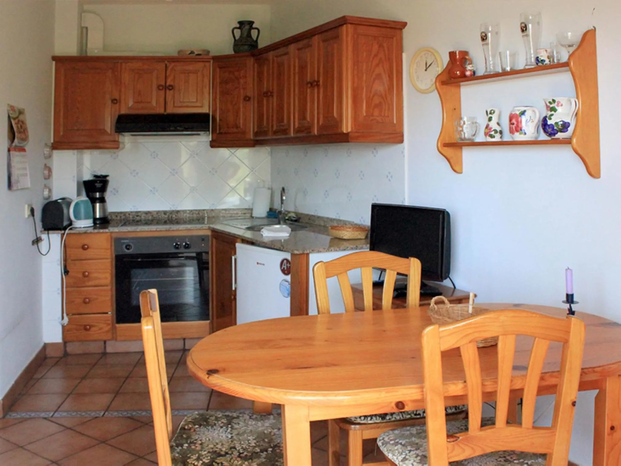 Kitchen or kitchenette in Apartamentos Atlantis