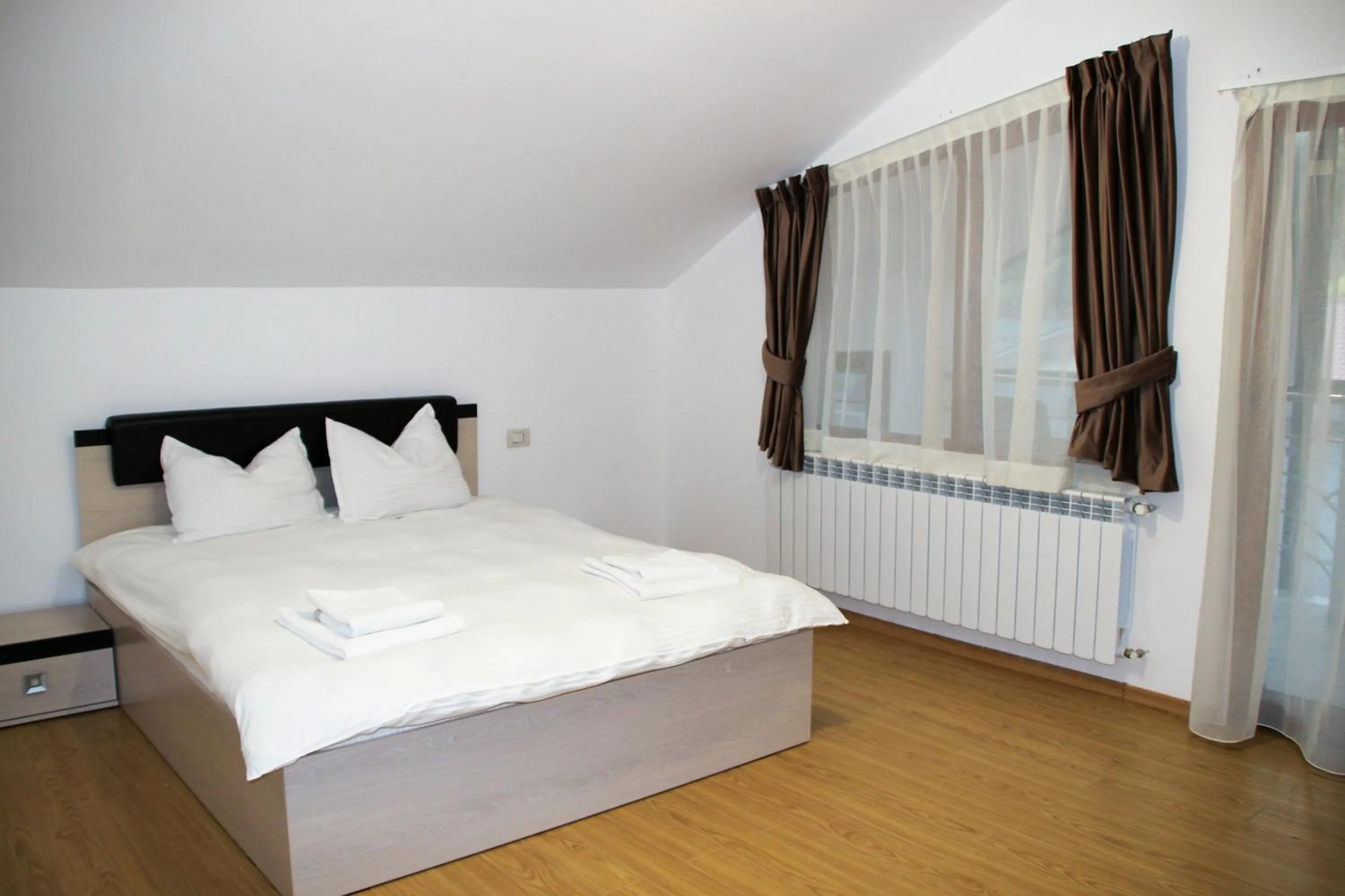 Photo of the whole room in Hotel Corina