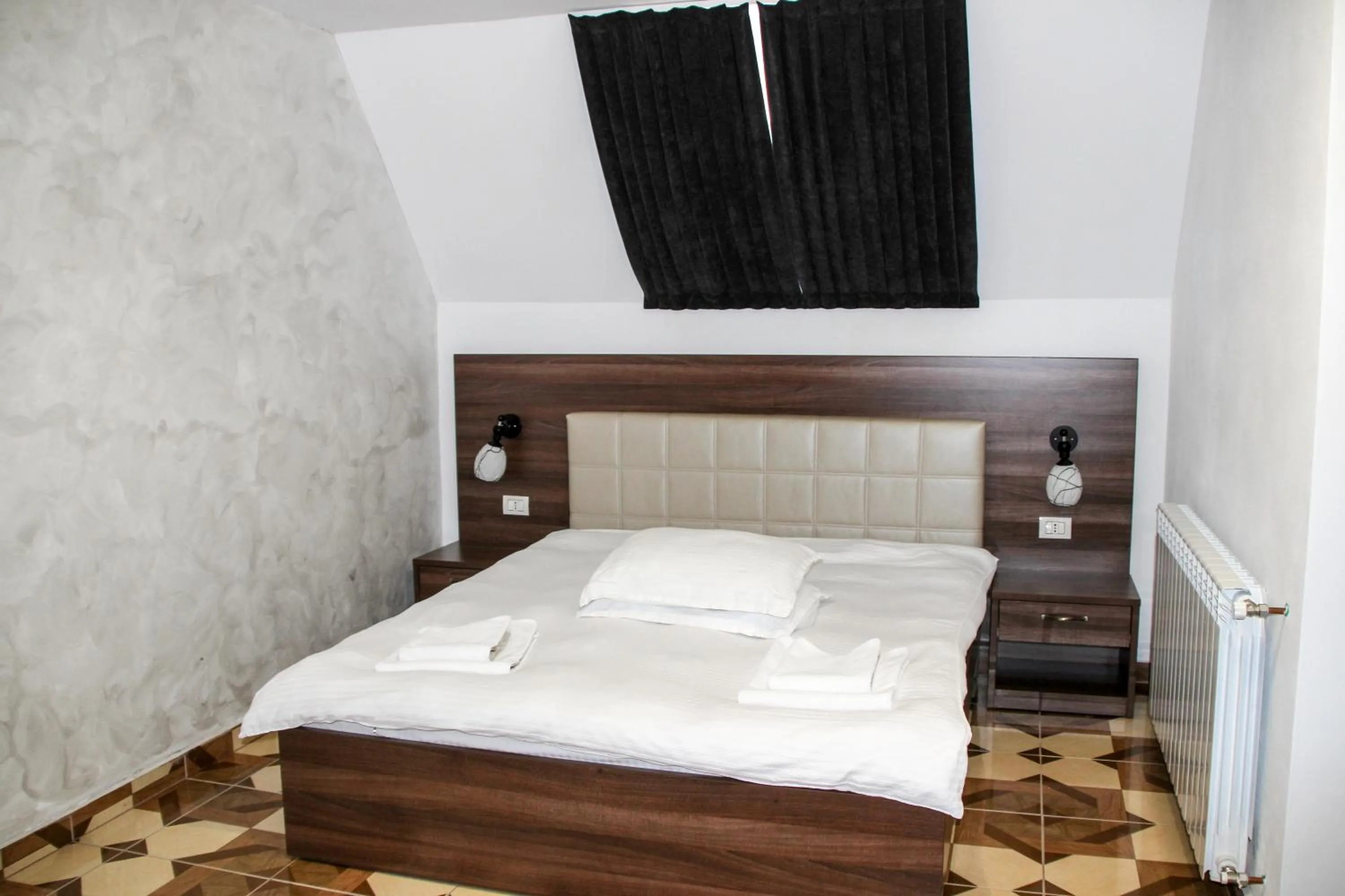 Photo of the whole room in Hotel Corina