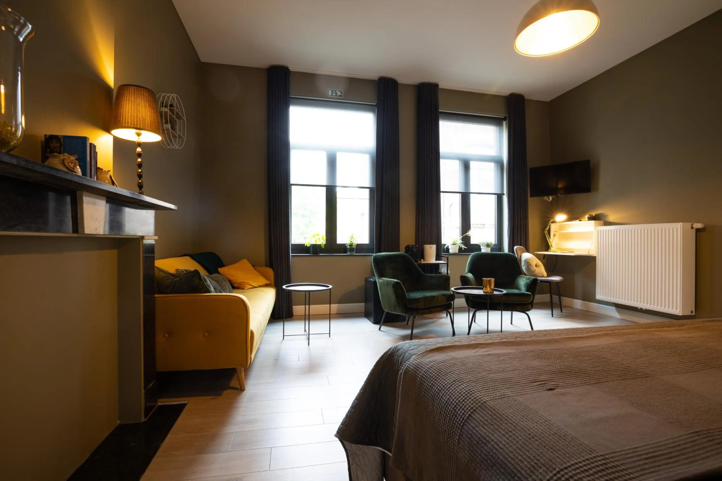 Seating area, Bed in B&B Gaudium XII