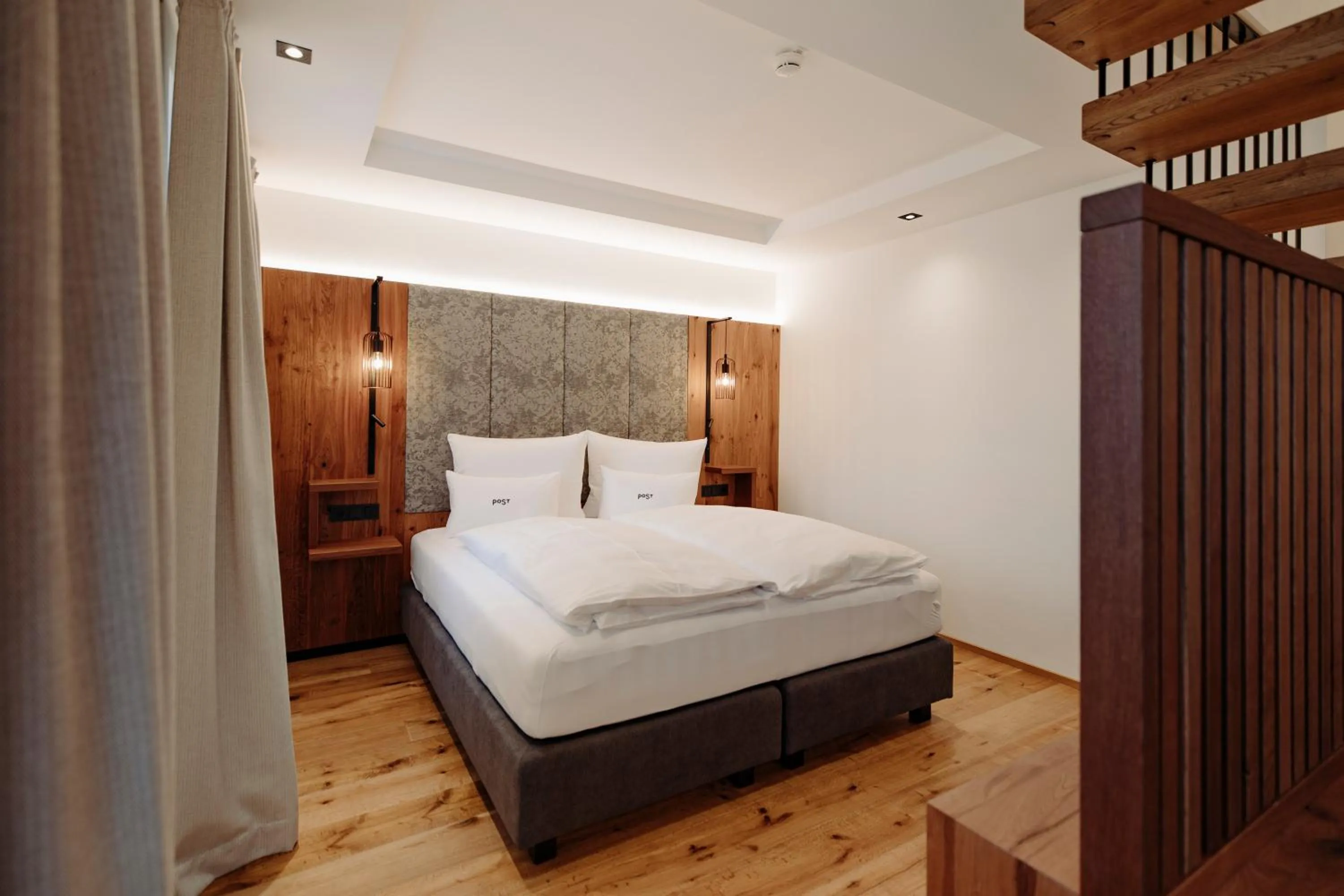 Bed in PoSt Boutique Apartments