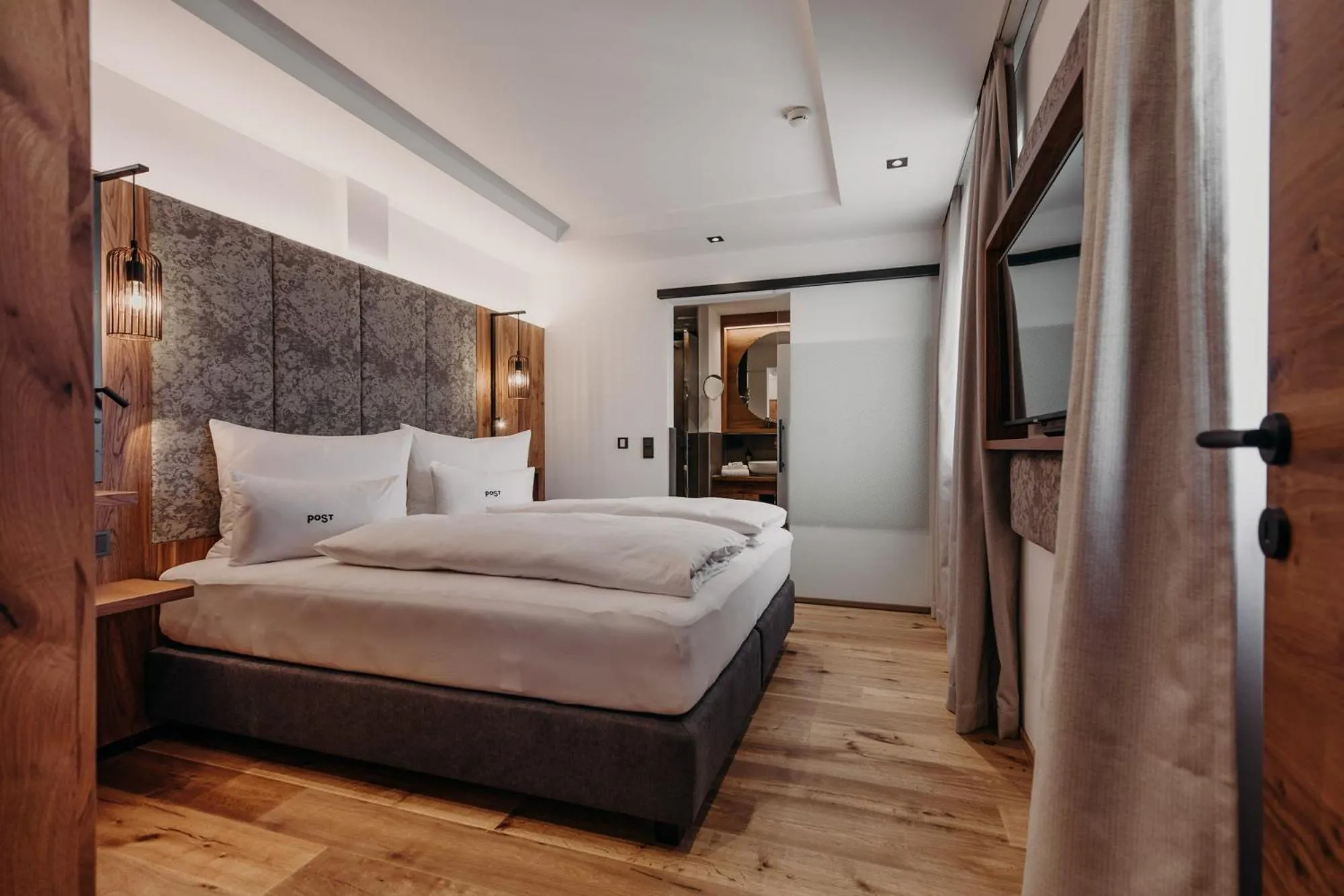 Bed in PoSt Boutique Apartments