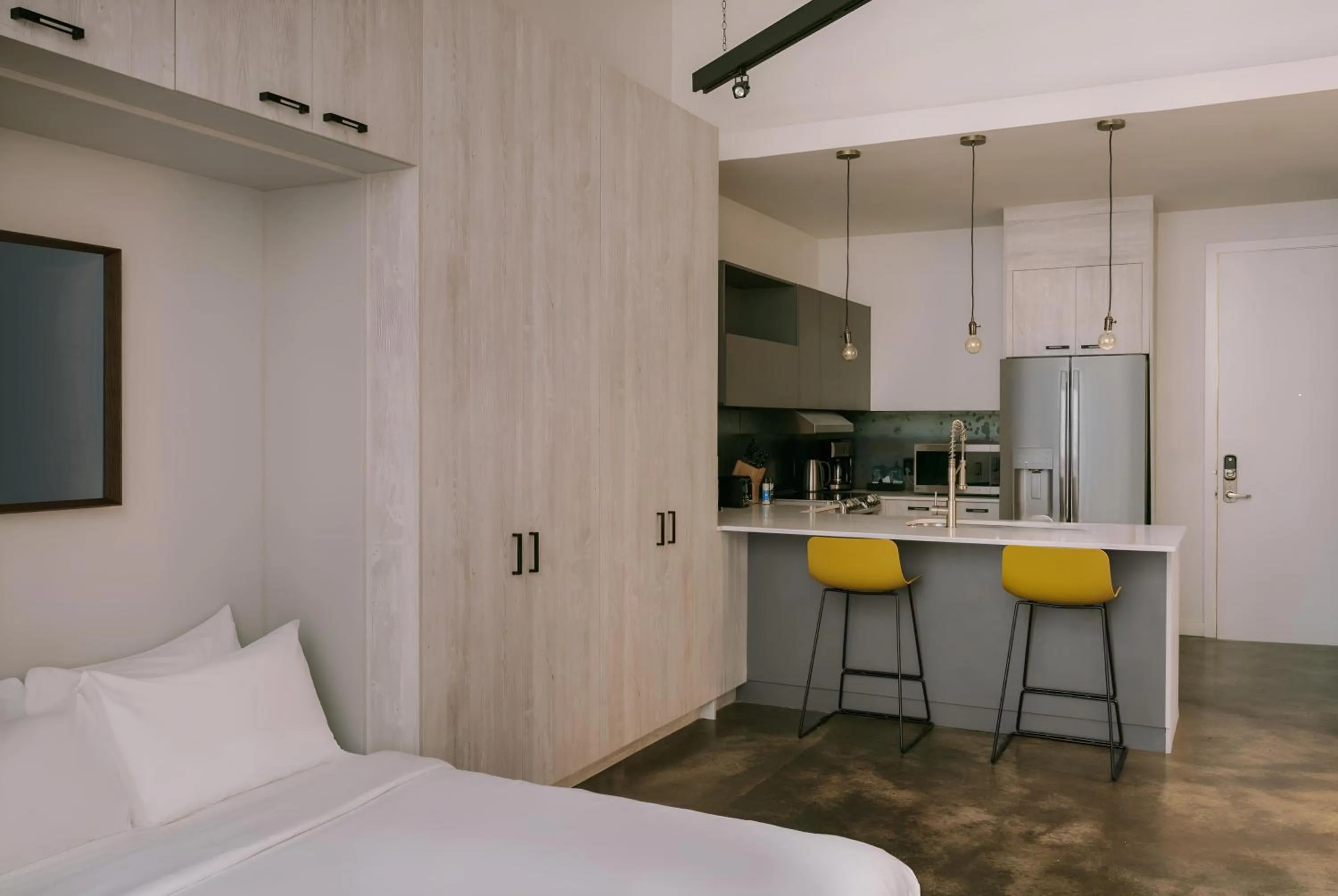 Photo of the whole room, Bed in The Heid Lofts by Reside, a Wyndham Residence