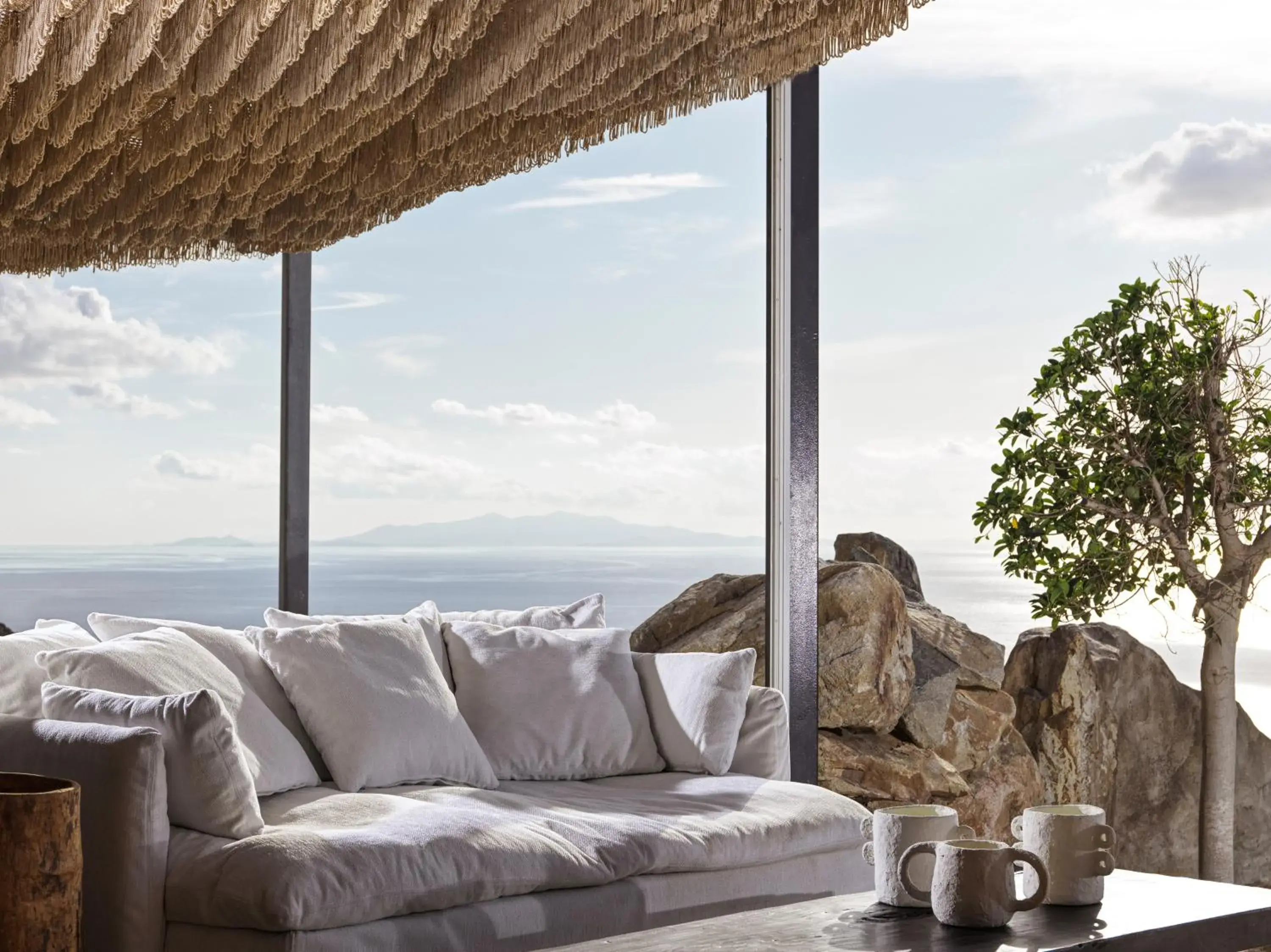 Seating area in Myconian Panoptis Escape, a member of Small Luxury Hotels of the World Seating area in Myconian Panoptis Escape, a member of Small Luxury Hotels of the World