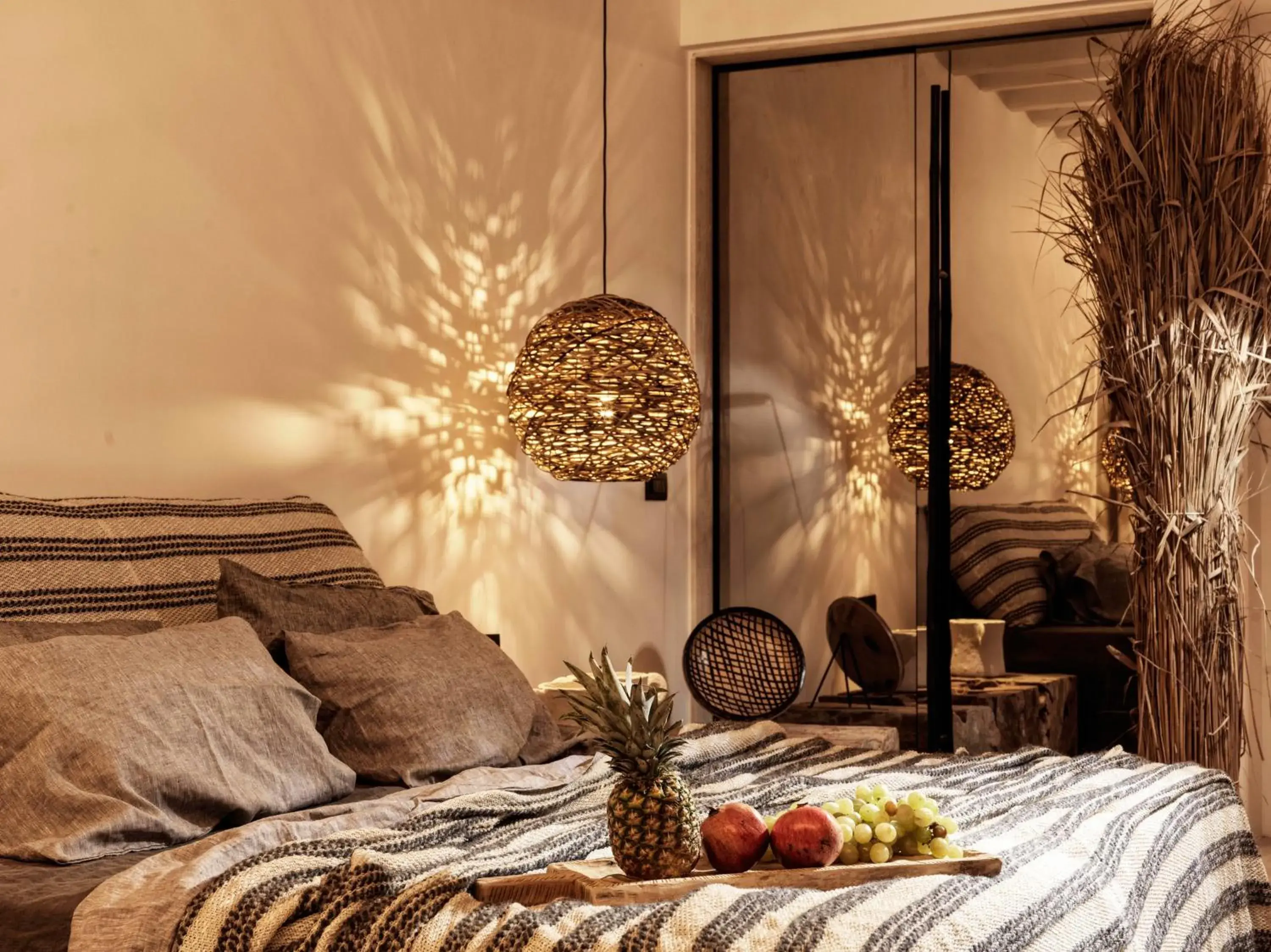 Bed in Myconian Panoptis Escape, a member of Small Luxury Hotels of the World Bed in Myconian Panoptis Escape, a member of Small Luxury Hotels of the World