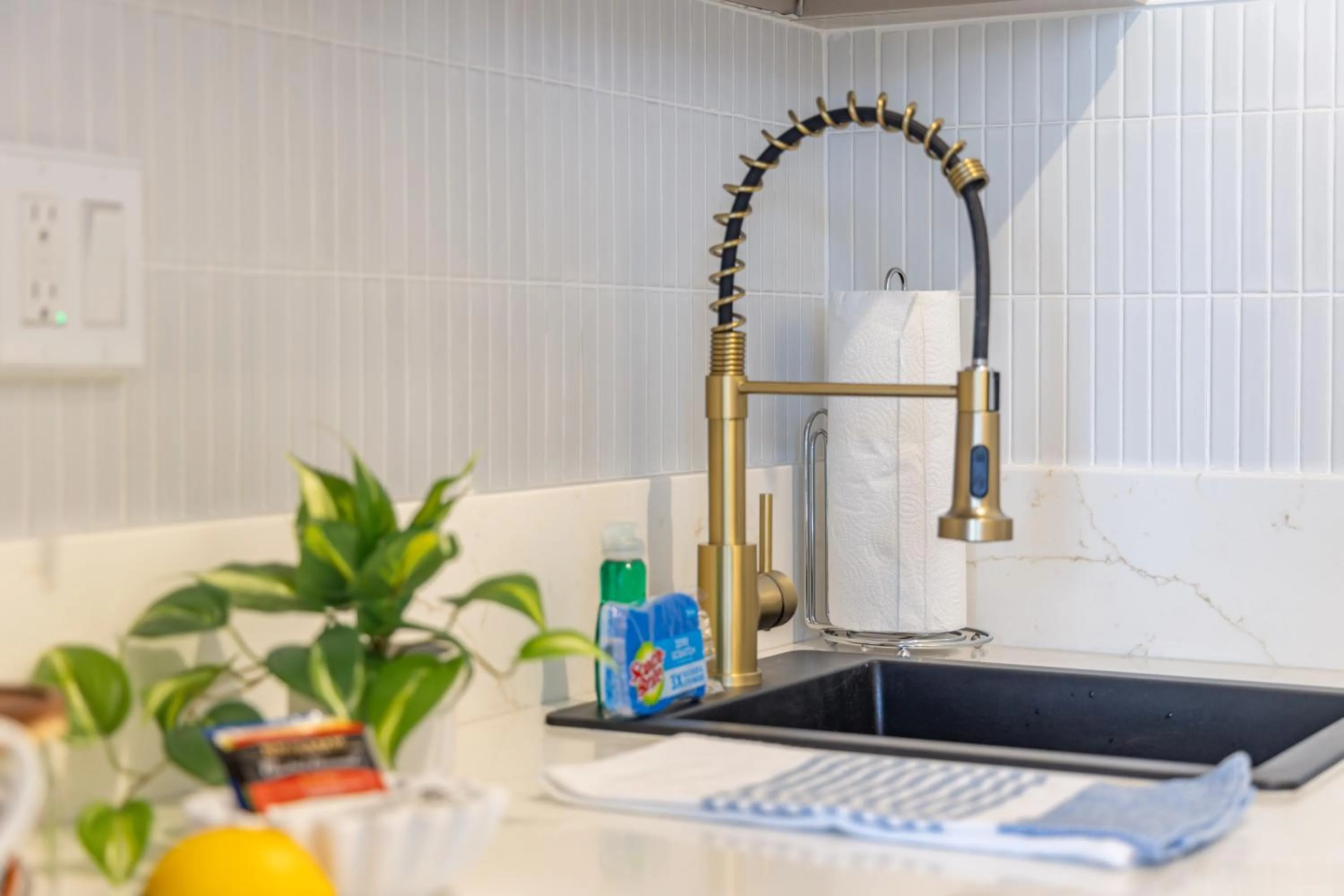 Kitchen or kitchenette in Steps to Waikiki Beach! Newly Renovated with 75" TV