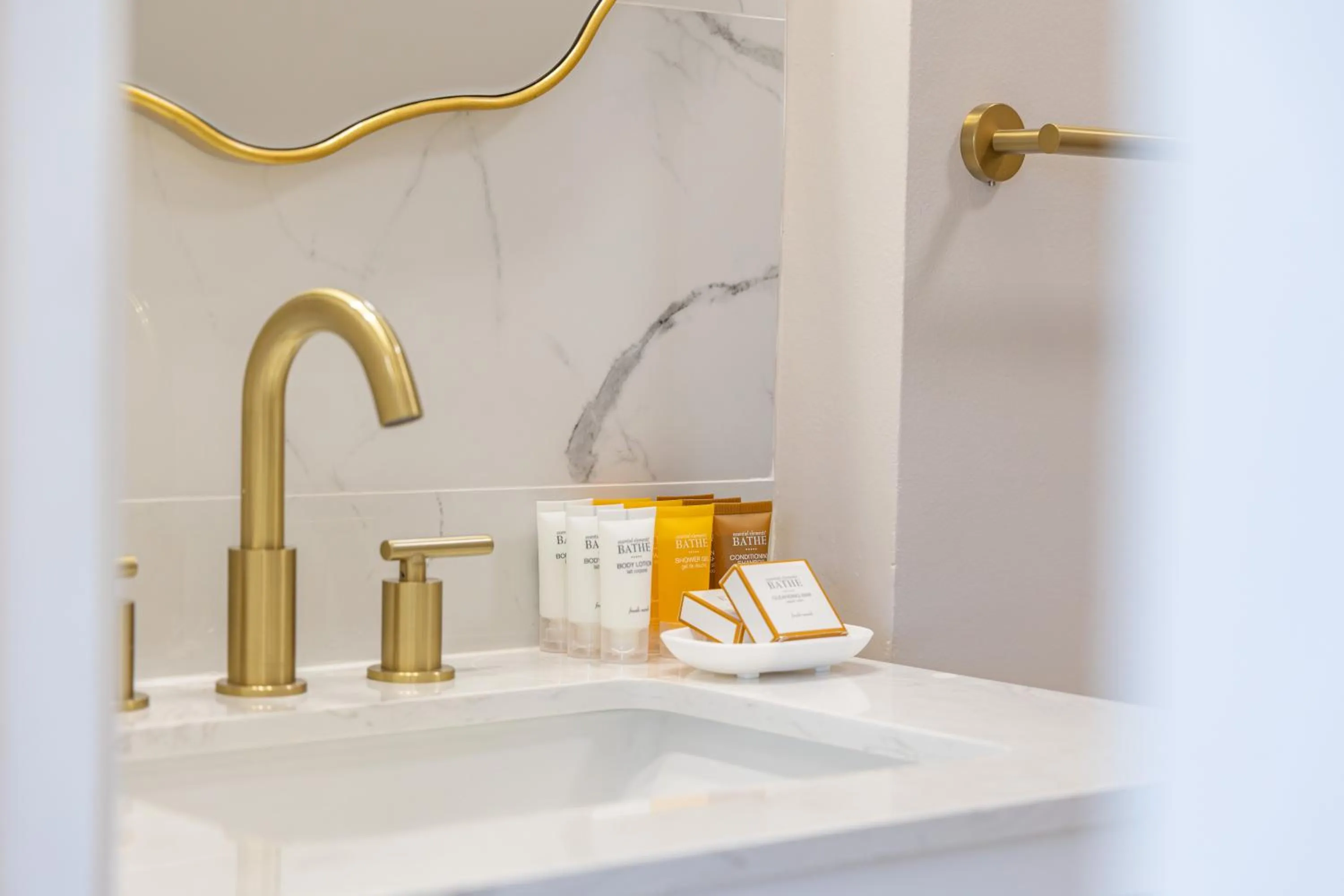 Bathroom in Steps to Waikiki Beach! Newly Renovated with 75" TV