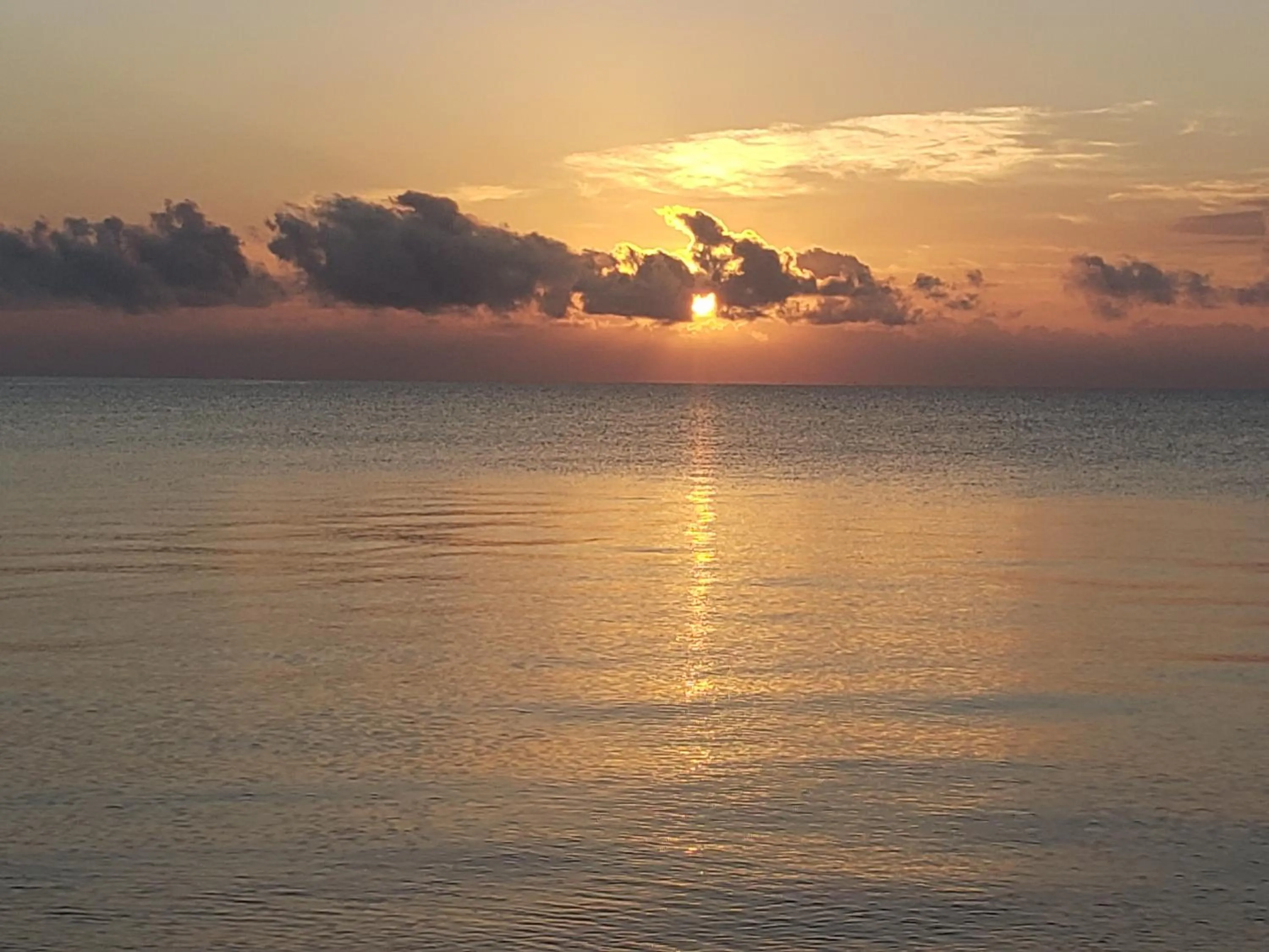Sunset in Pal's on the beach - Dangriga, Belize