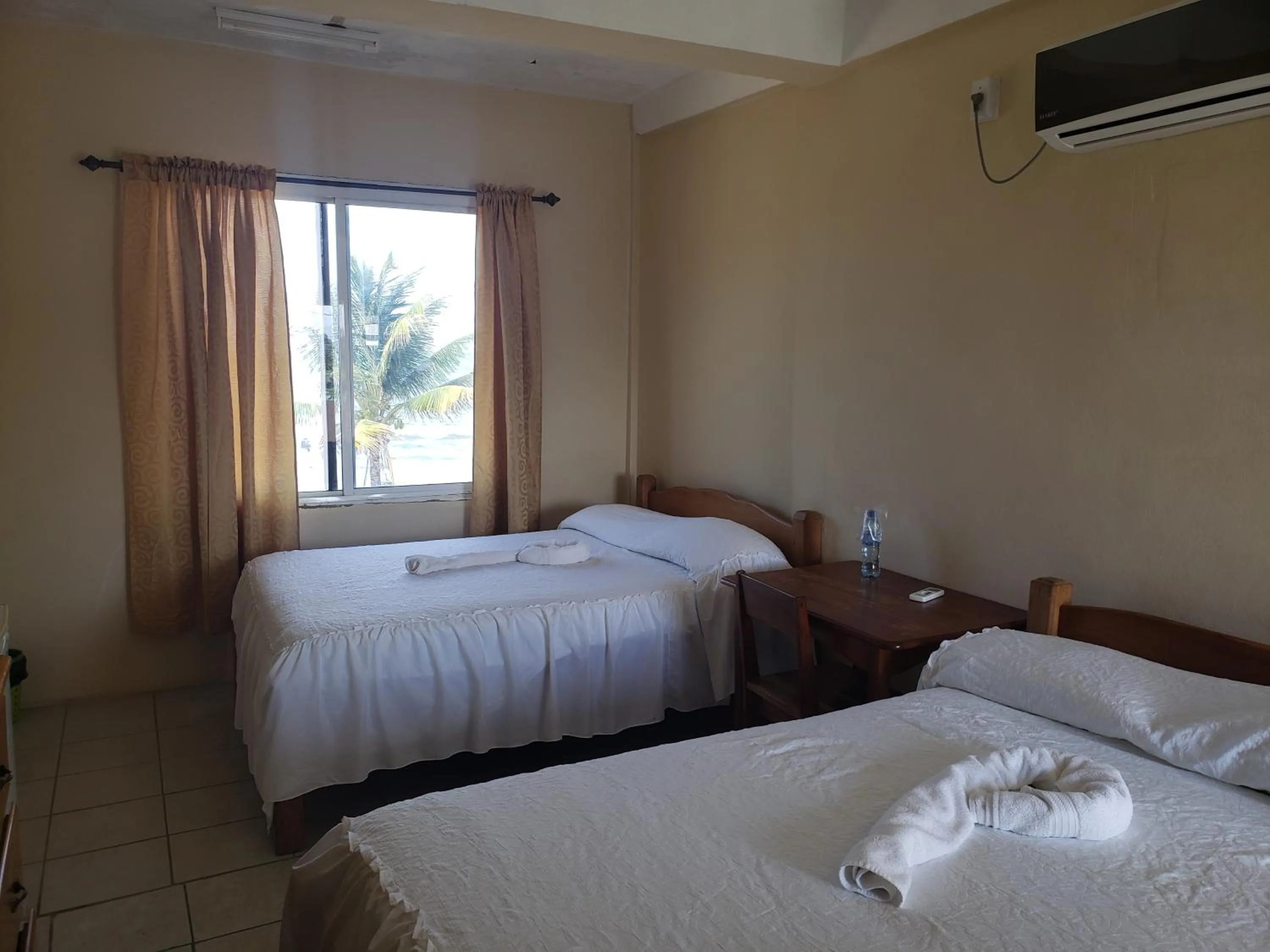 Photo of the whole room, Bed in Pal's on the beach - Dangriga, Belize