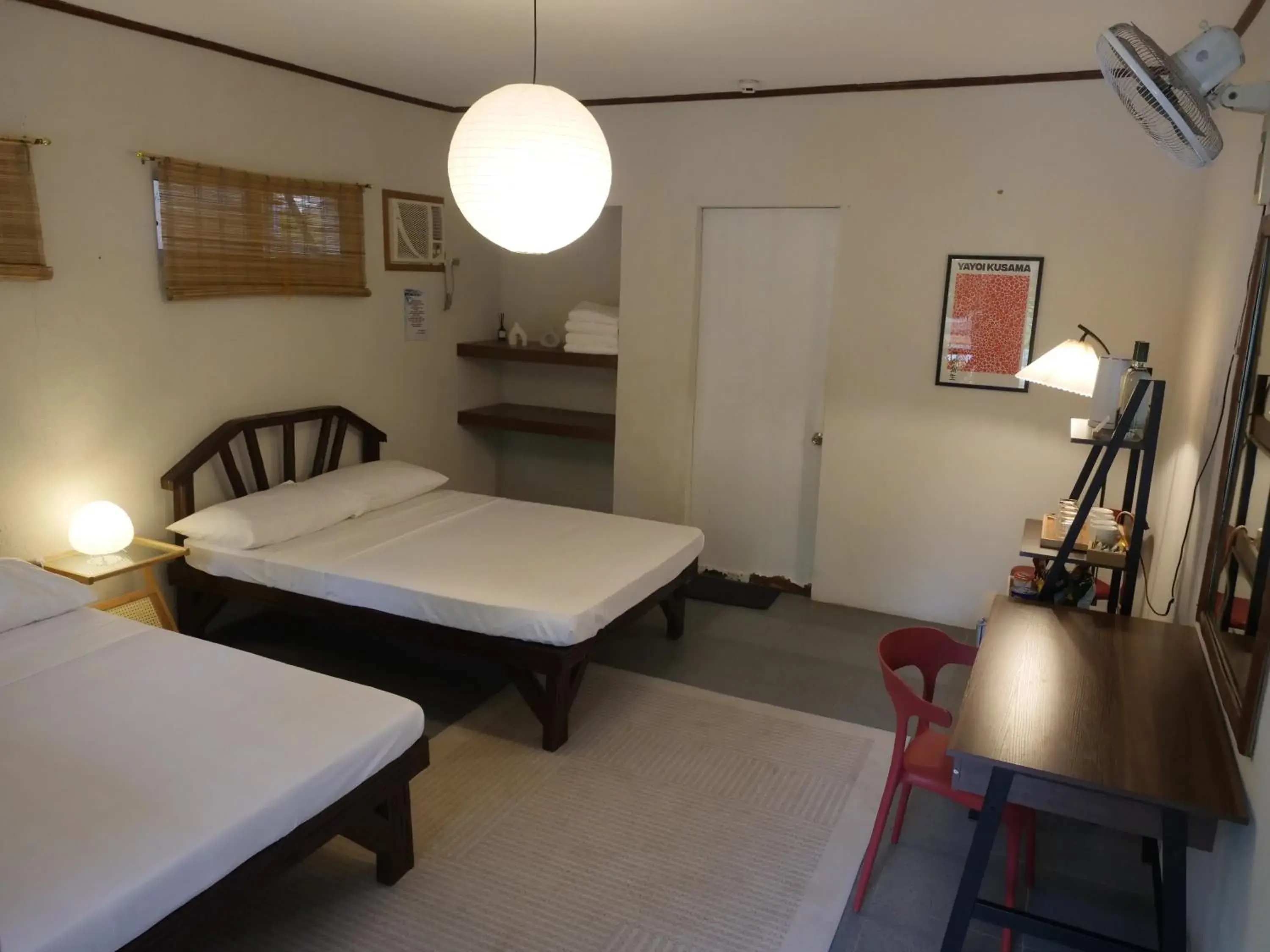 Bed in The Shark's Tail Dive Resort Bed in The Shark's Tail Dive Resort