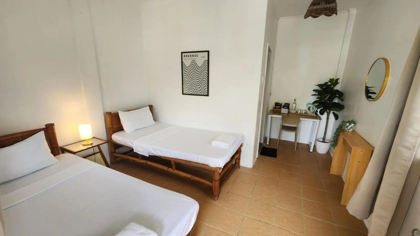 Bed in The Shark's Tail Dive Resort