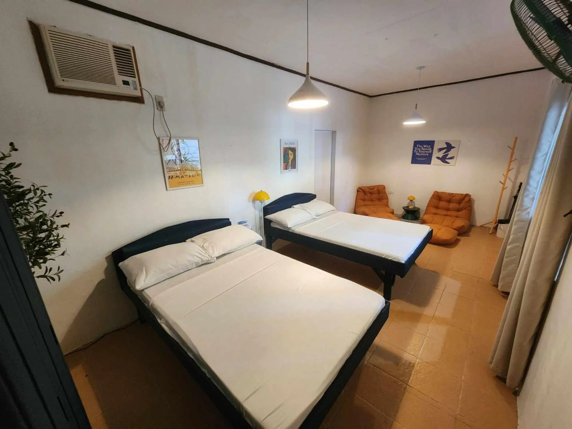 Bed in The Shark's Tail Dive Resort