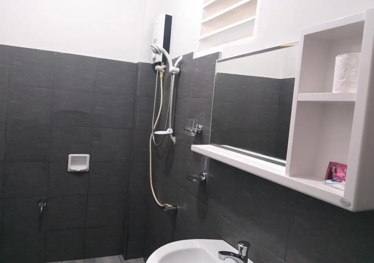 Bathroom in The Shark's Tail Dive Resort