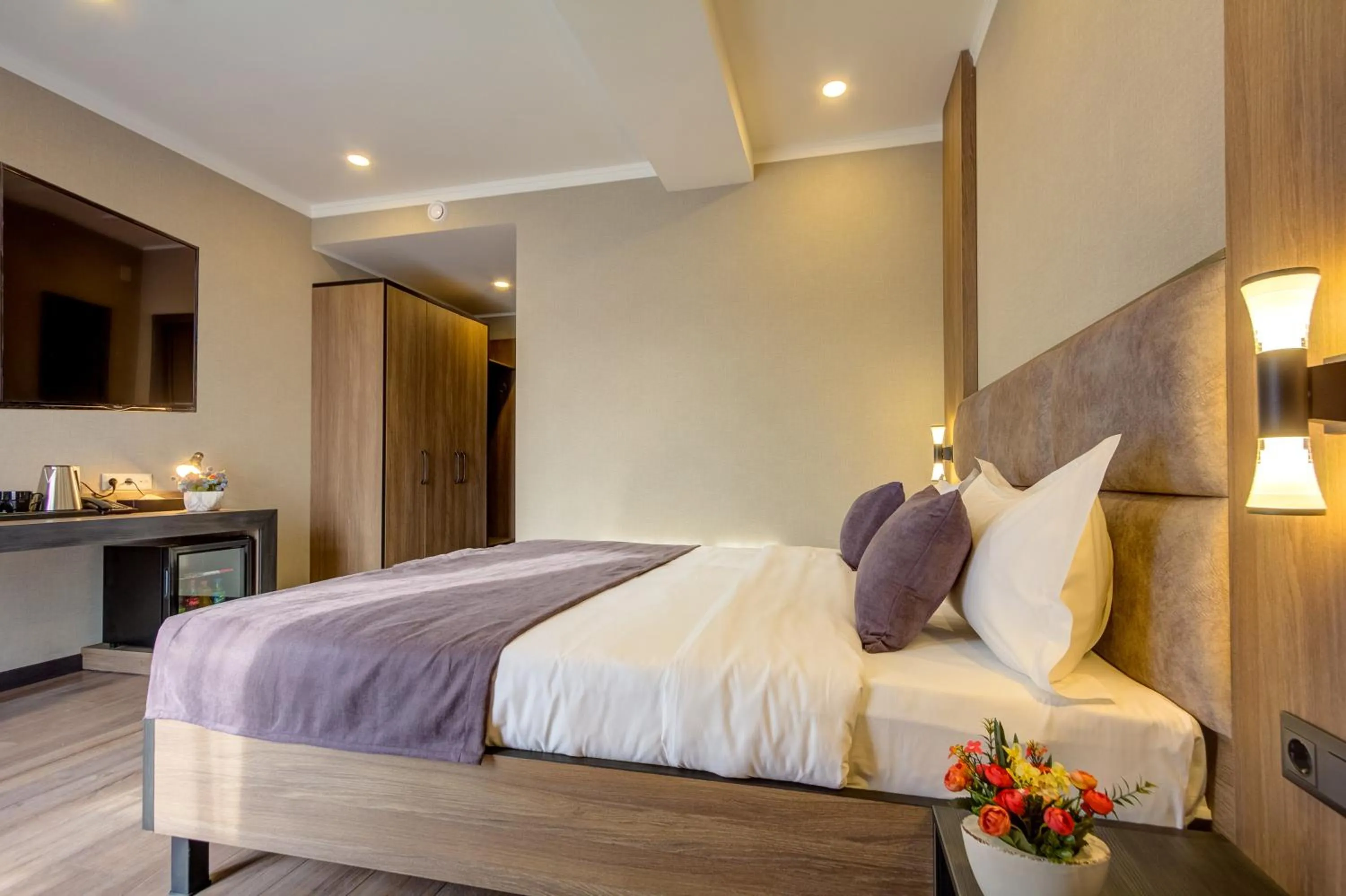 Bed in Sara Hotel Bishkek