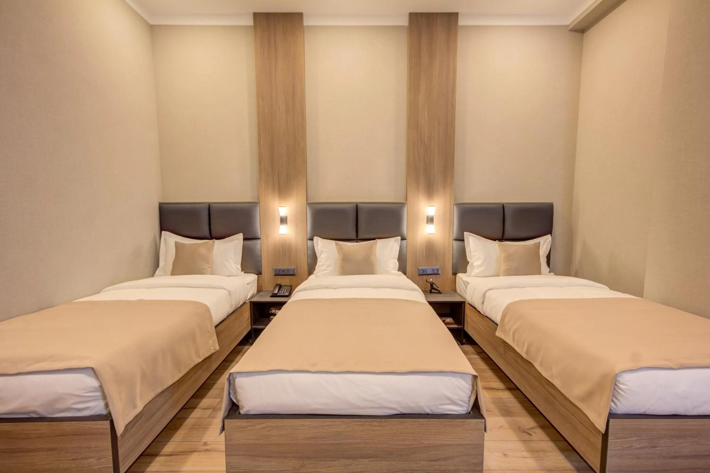 Bed in Sara Hotel Bishkek