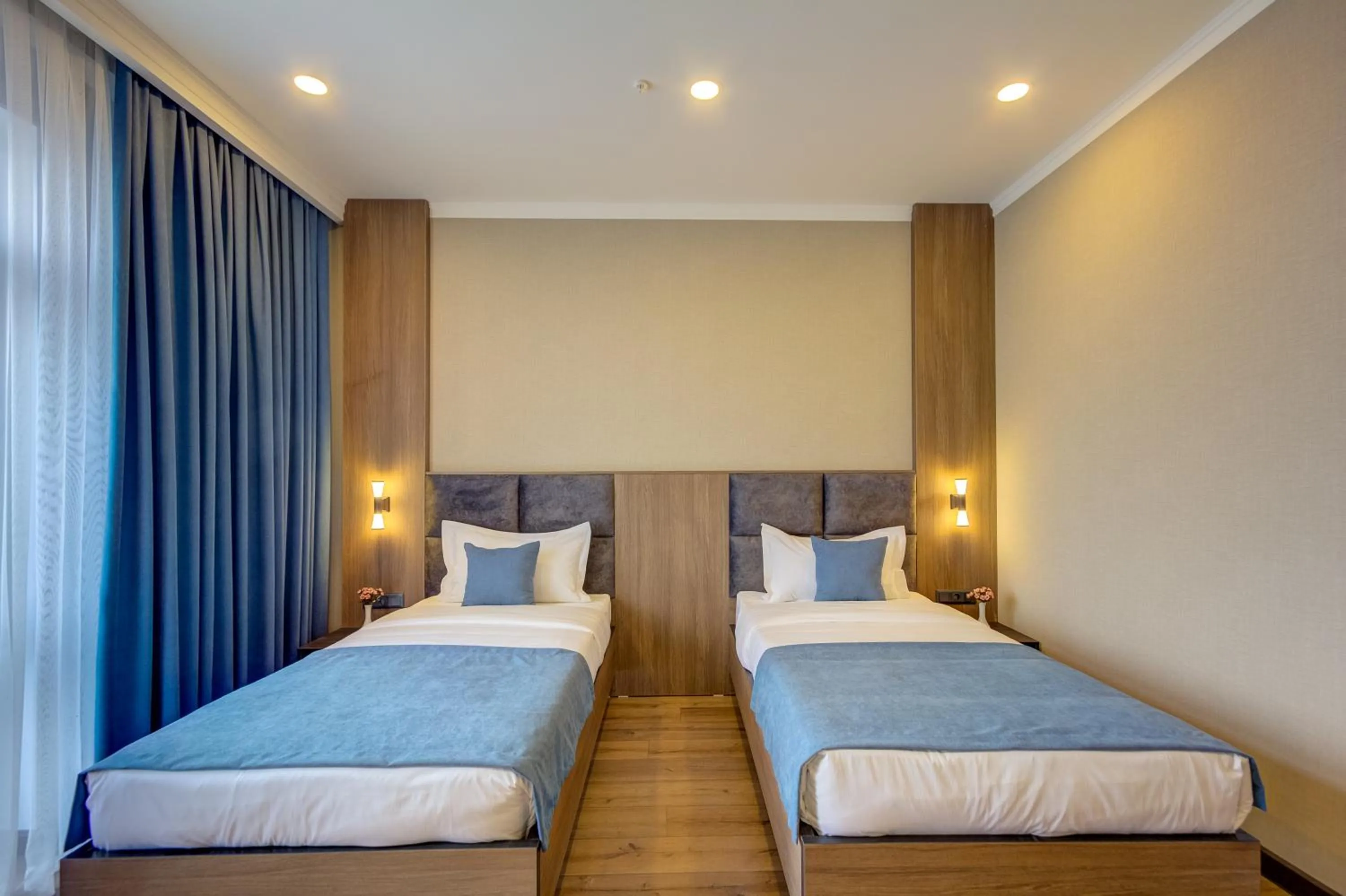 Bed in Sara Hotel Bishkek