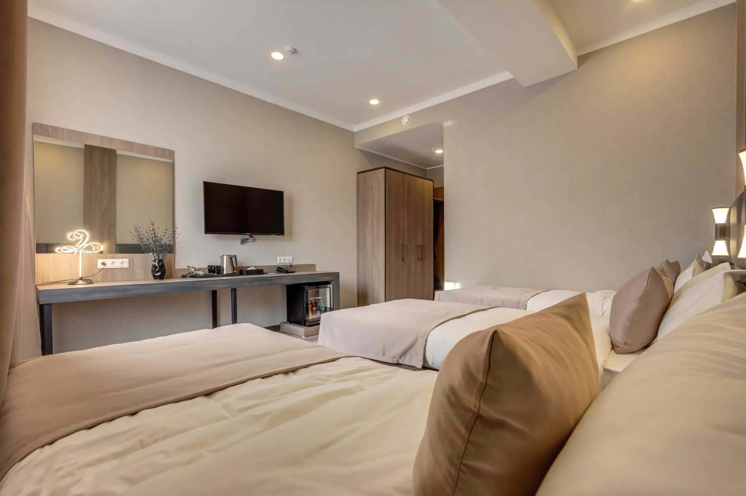 Bed in Sara Hotel Bishkek