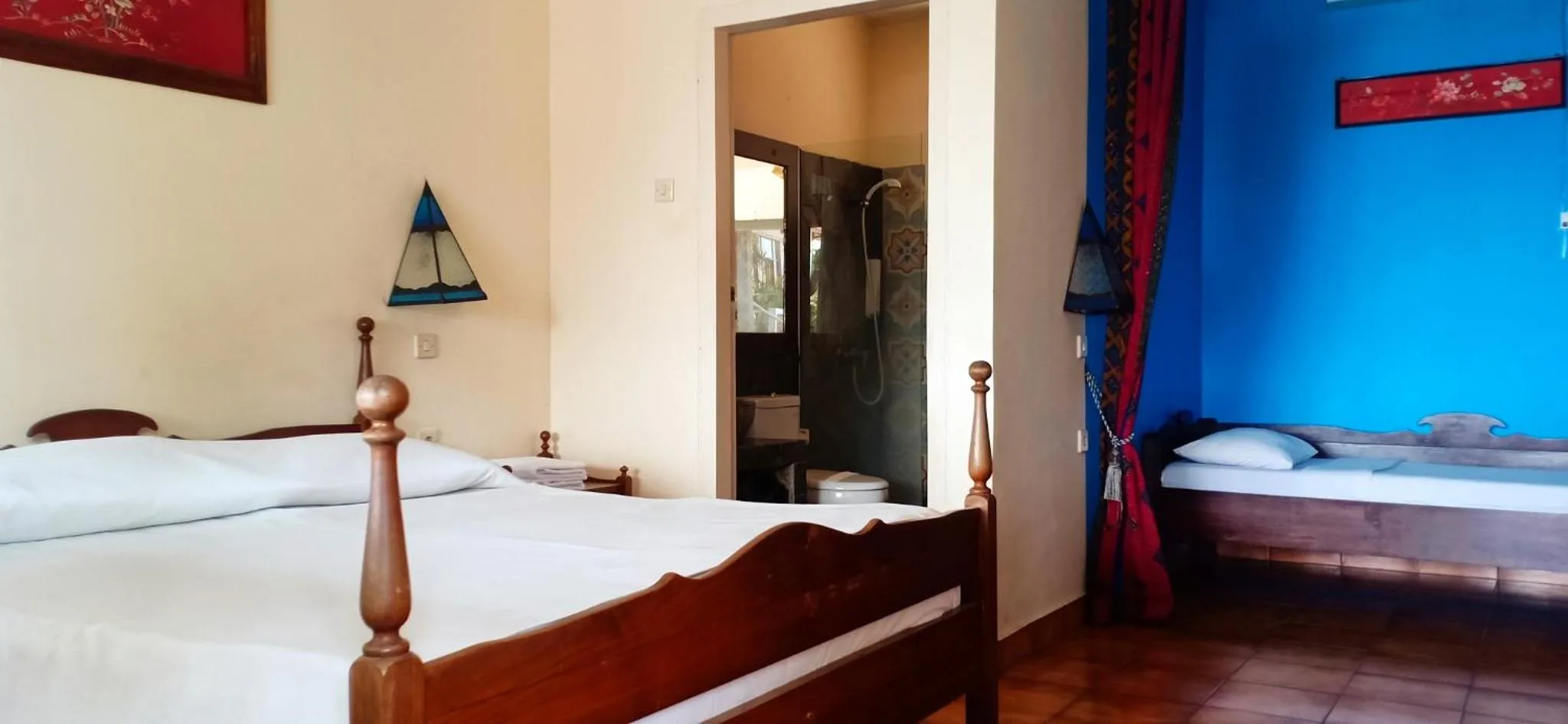 Bed in Bunga Ayu Seaside Resort