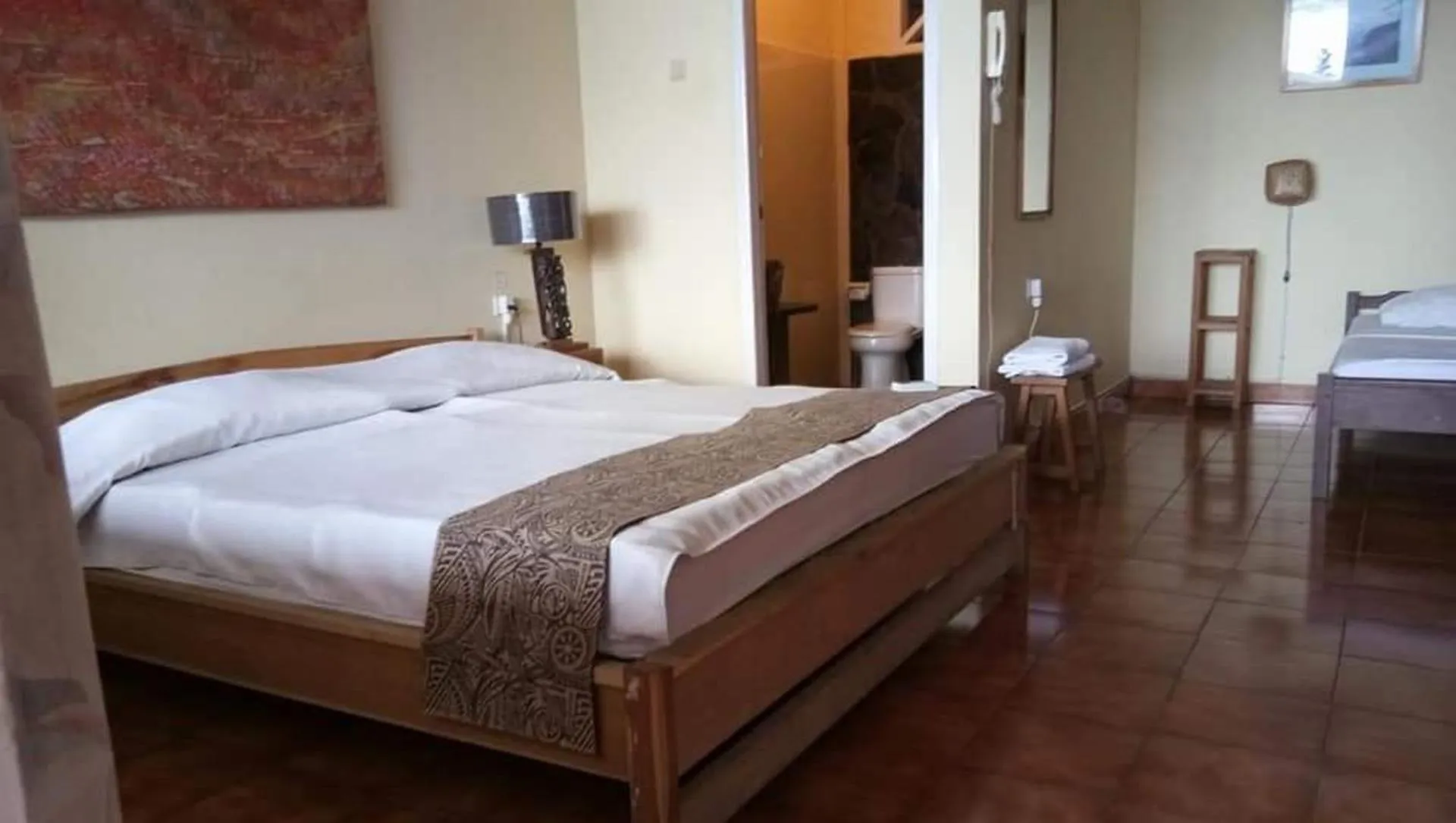 Bed in Bunga Ayu Seaside Resort