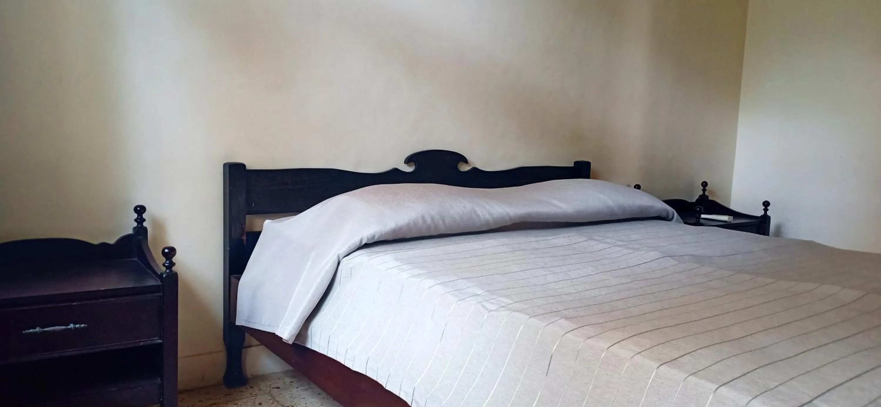 Bed in Bunga Ayu Seaside Resort