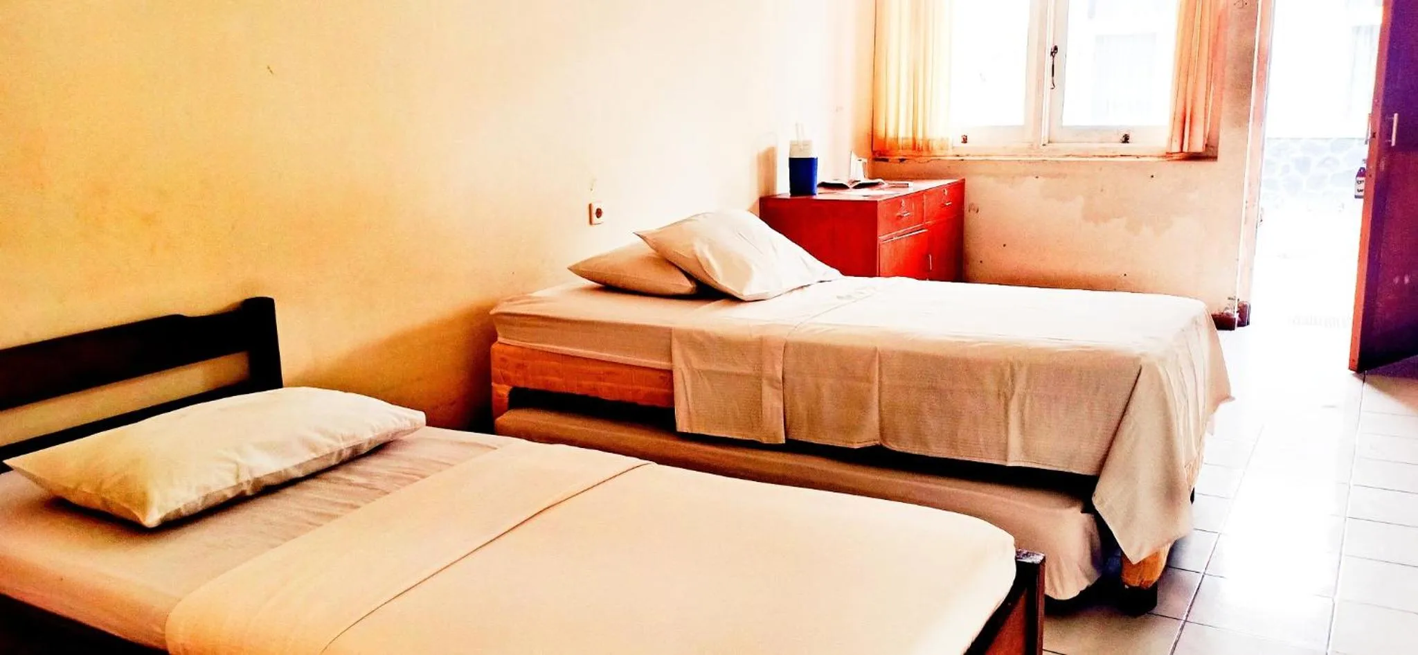 Bed in Bunga Ayu Seaside Resort