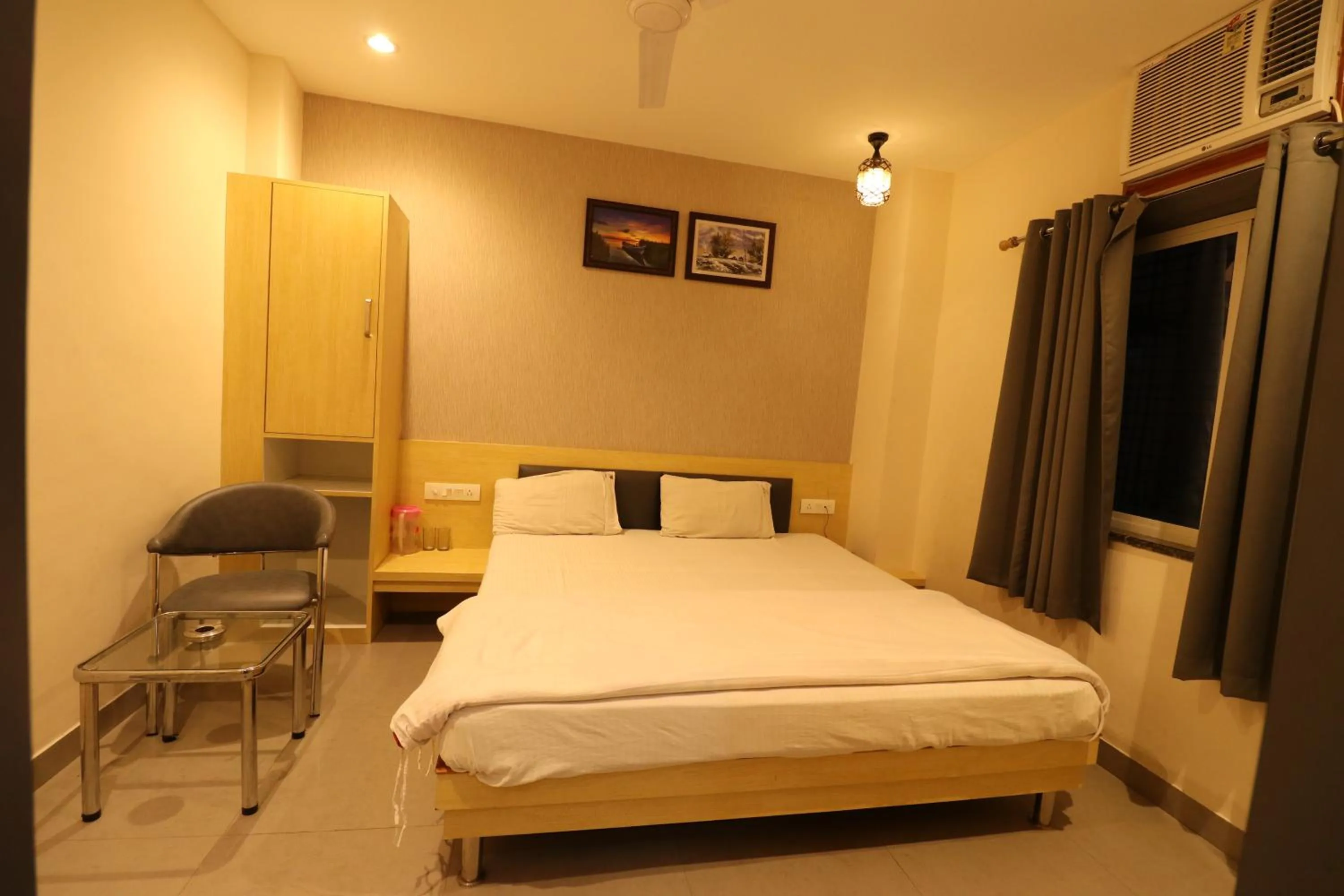 Photo of the whole room, Bed in HOTEL PRATAP GRAND