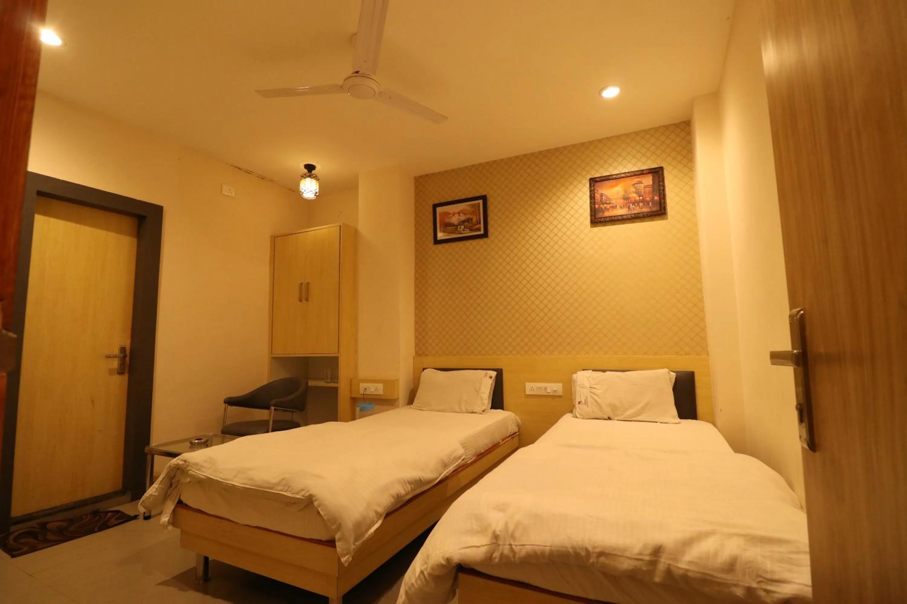 Photo of the whole room, Bed in HOTEL PRATAP GRAND