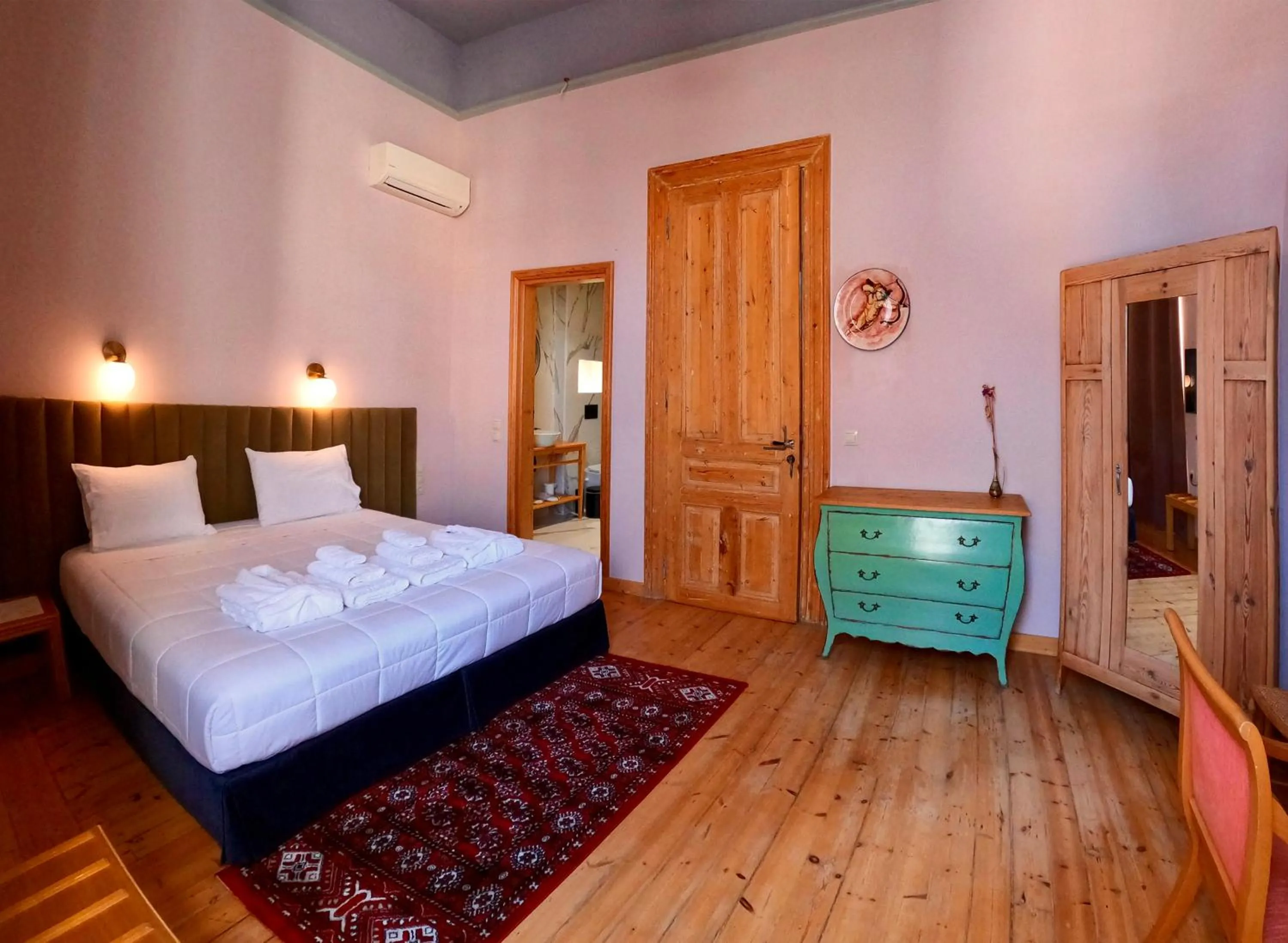Property building, Bed in VASILIKON Hotel 1888 the past is present HISTORICAL PRESERVATION MONUMENT