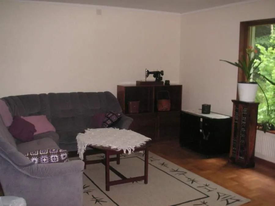 Communal lounge/ TV room in Ängens B&B
