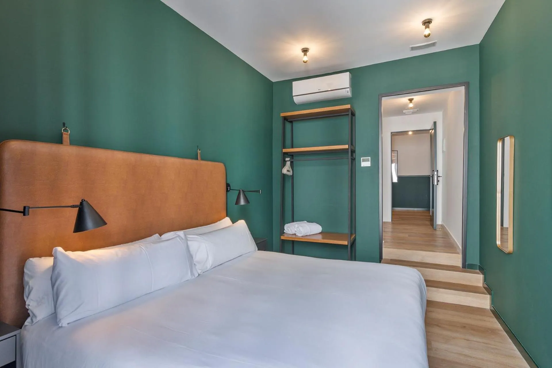 Bed in Uma Suites Atocha