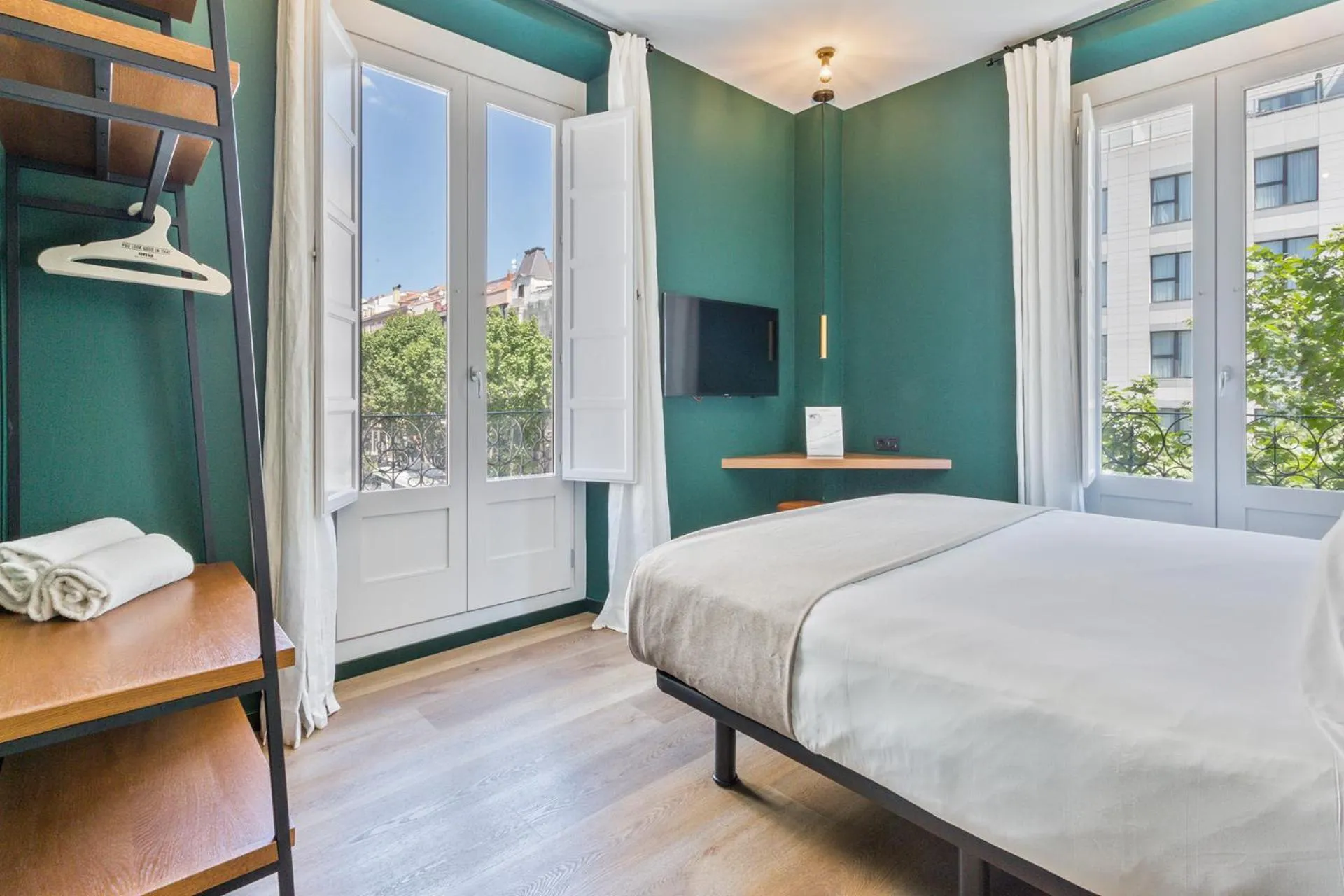 Bed in Uma Suites Atocha