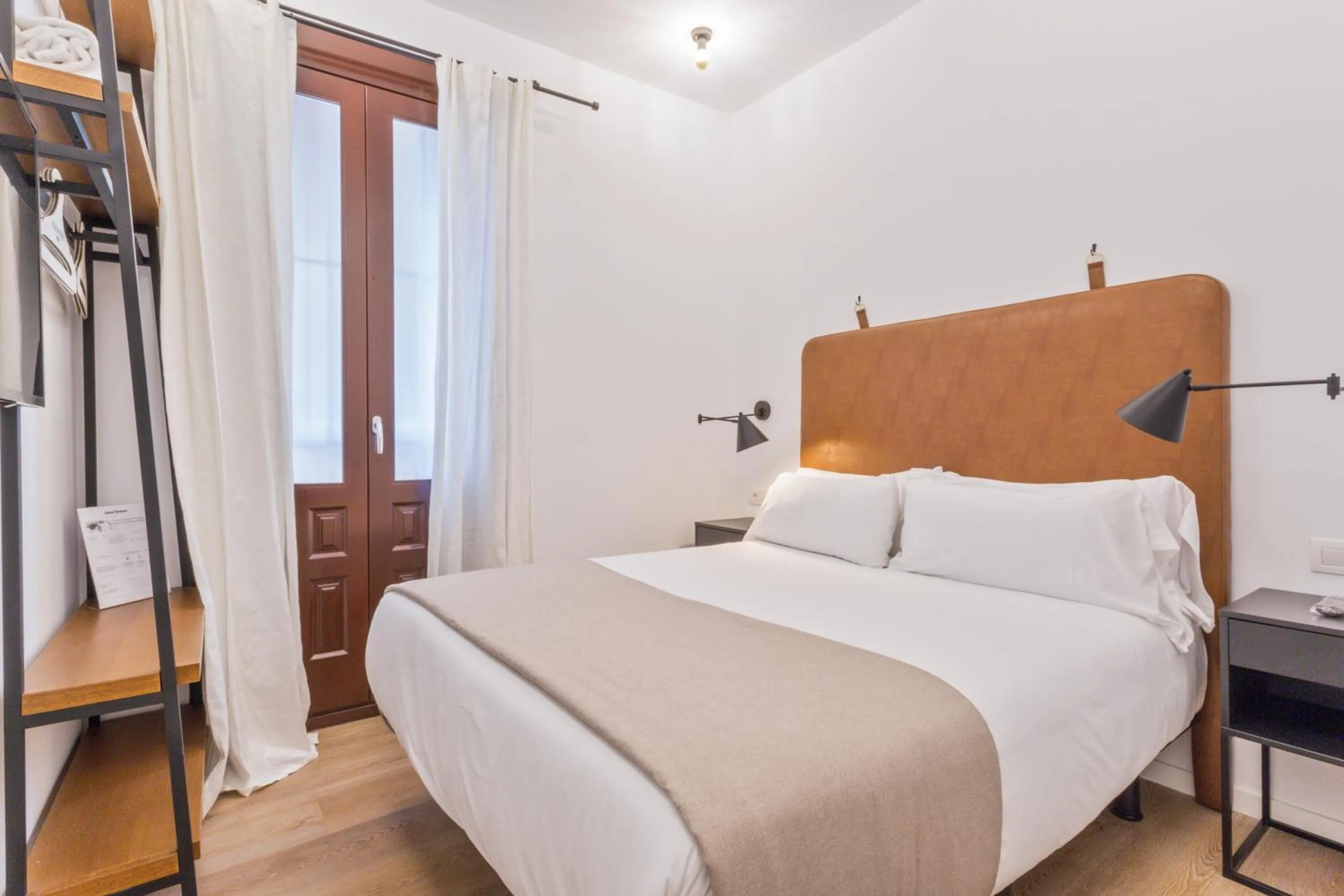 Bedroom, Bed in Uma Suites Atocha