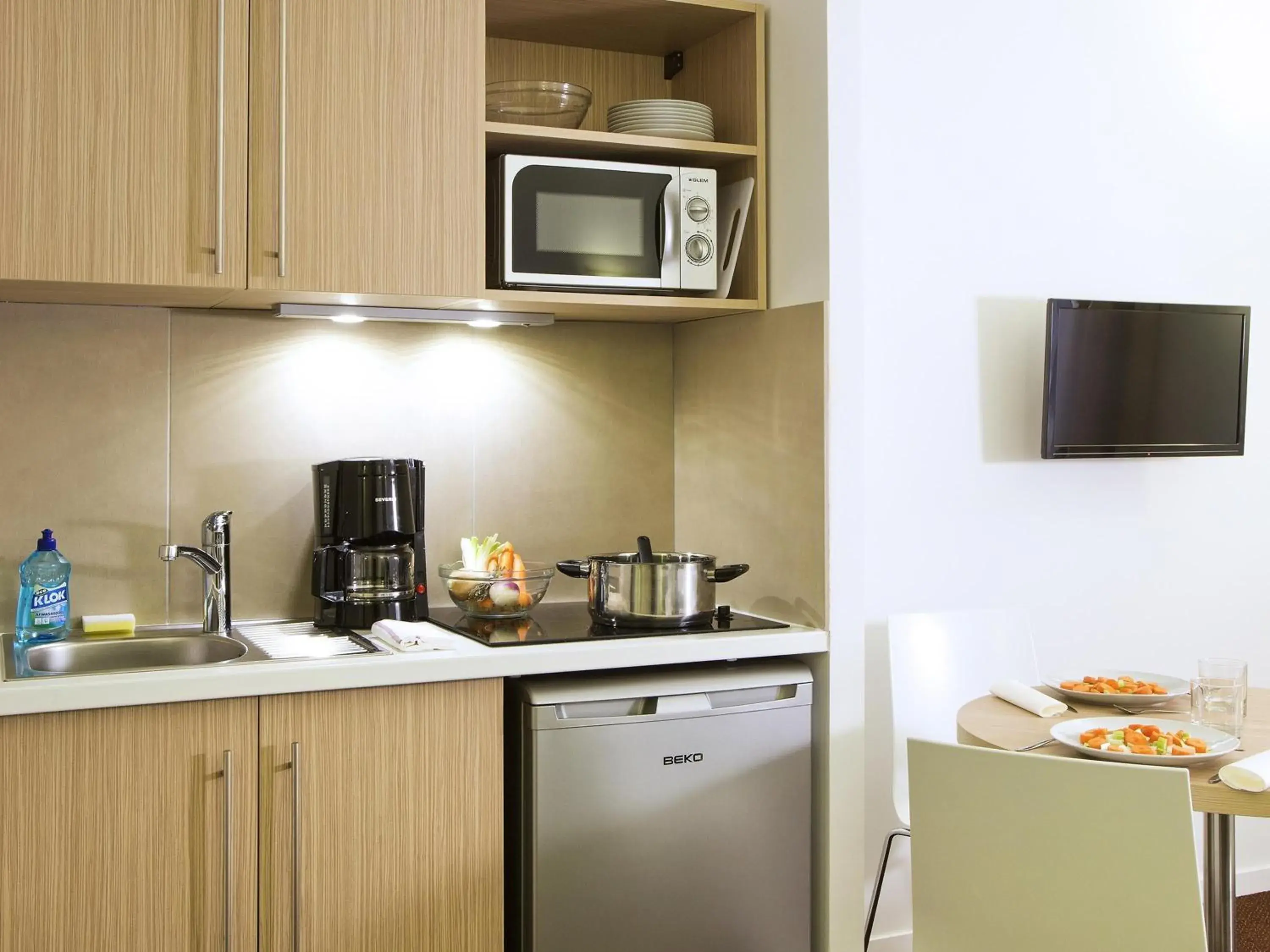 Bedroom in Aparthotel Adagio Access Le Havre Les Docks Bedroom in Aparthotel Adagio Access Le Havre Les Docks