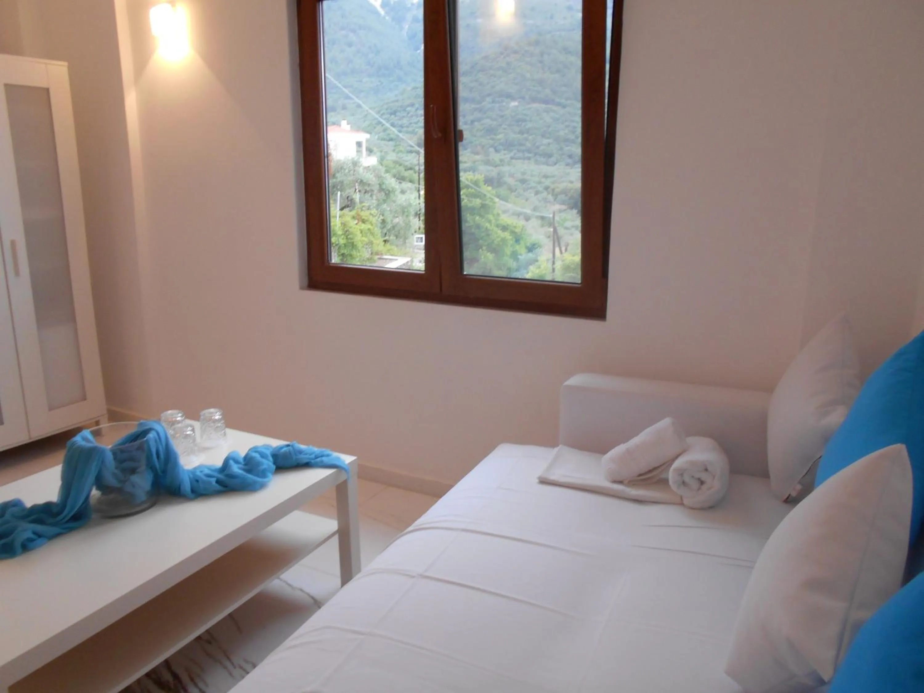 Bed in Kinira Beach Hotel