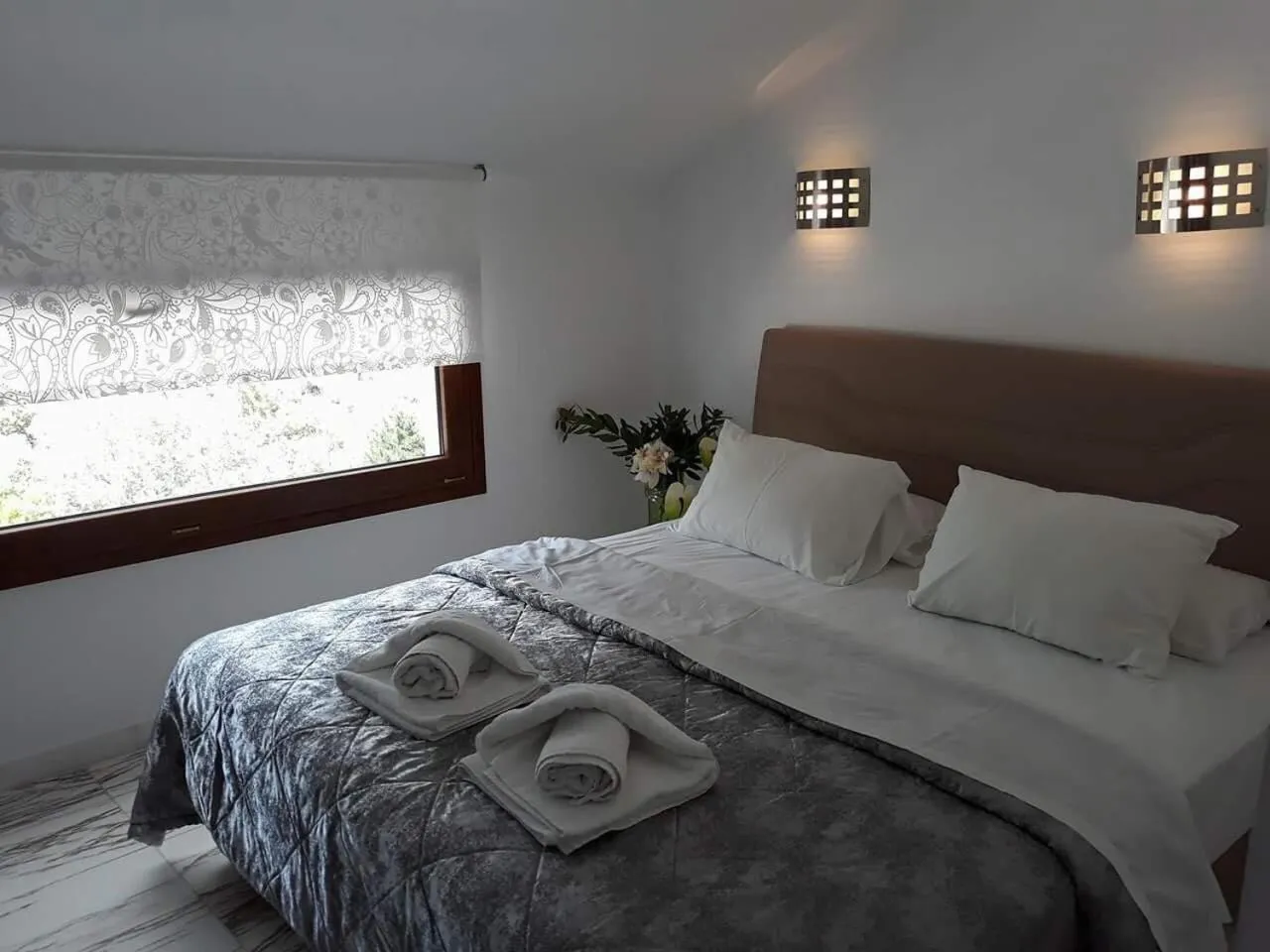 Bed in Kinira Beach Hotel