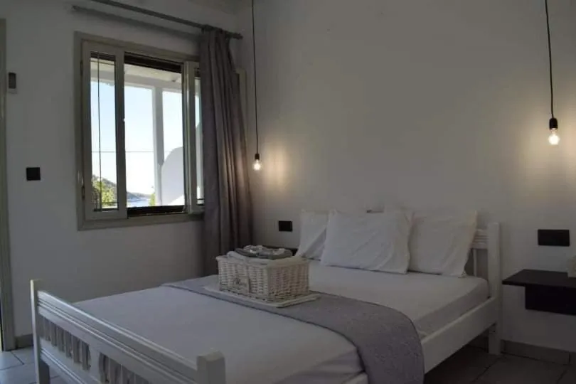 Bed in Kinira Beach Hotel